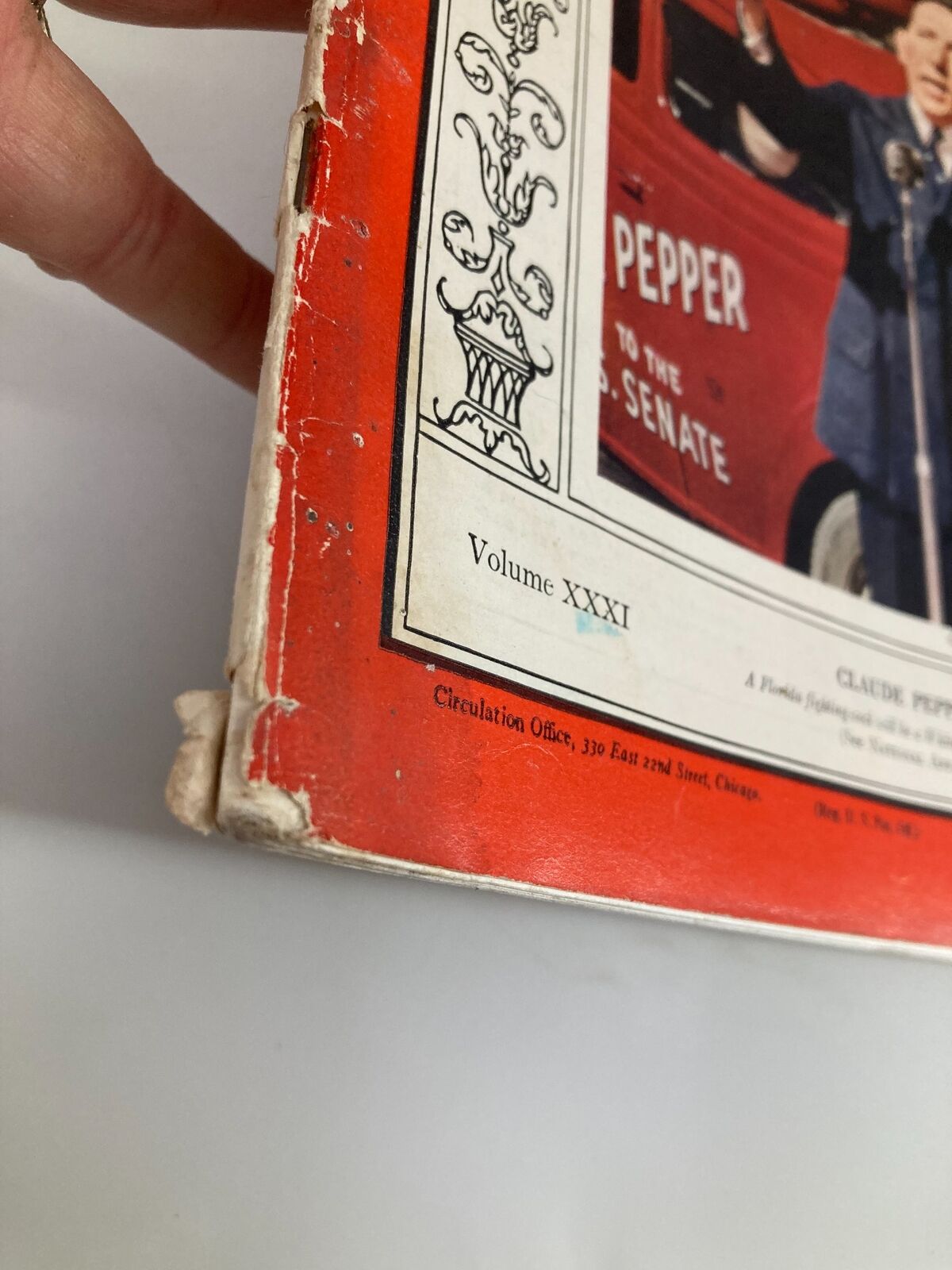 Detailed view of the spine of Vintage Time Magazine May 2, 1938, indicating wear and vintage condition.