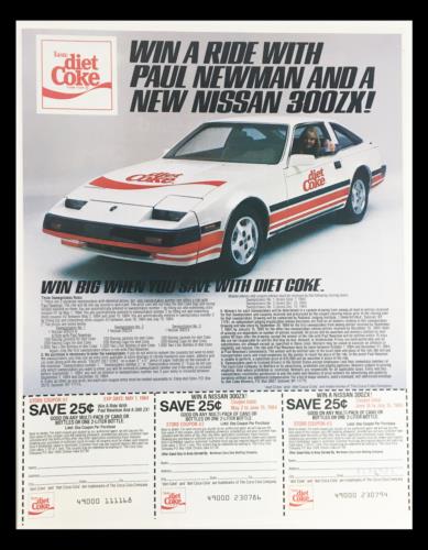 1984 Diet Coke Paul Newman Nissan 300ZX Circular Coupon Advertisement featuring a Nissan 300ZX car and promotional text offering a chance to win a ride with Paul Newman.