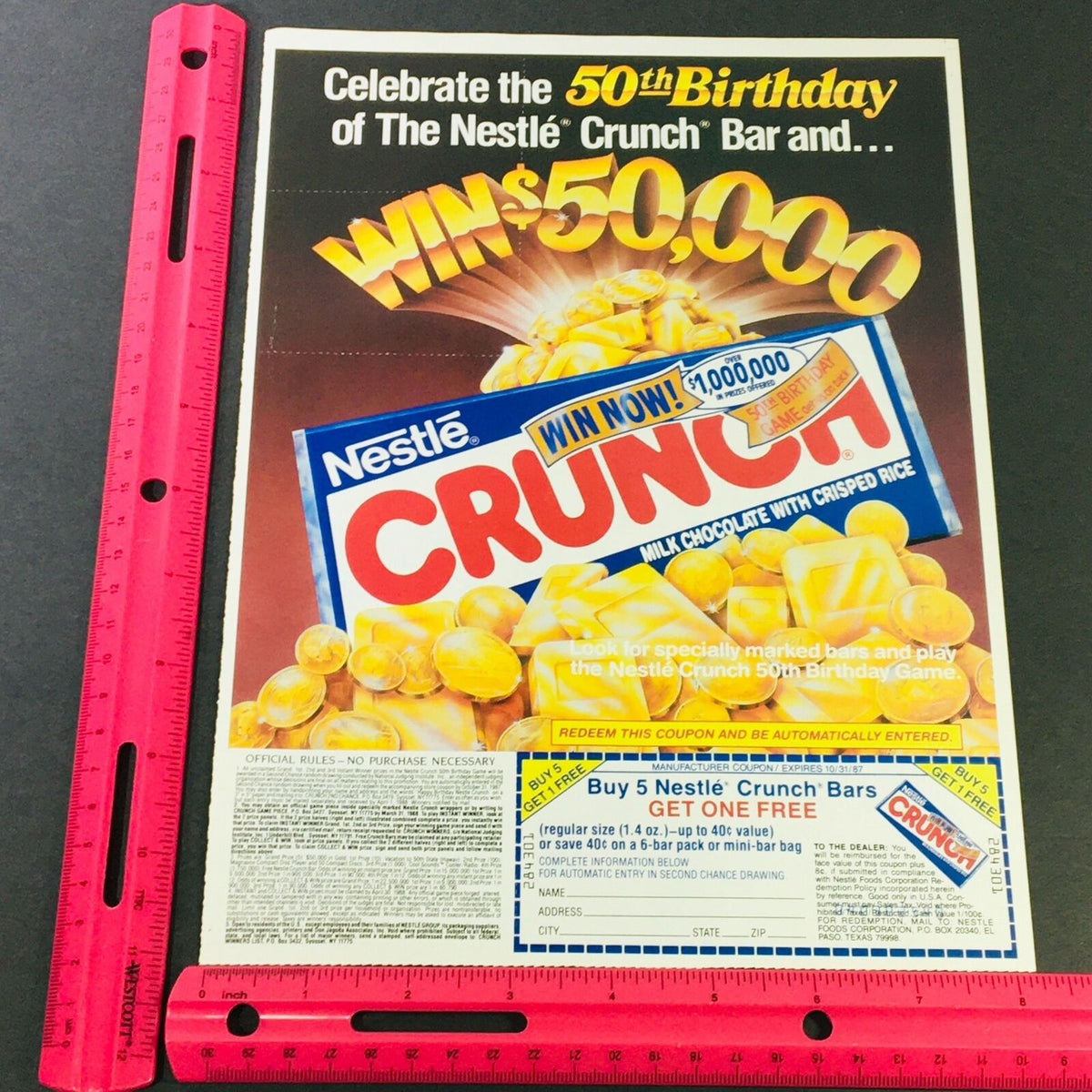 VTG Retro 1987 The Nestle Crunch Bar advertisement featuring a ruler for scale. Celebrating the 50th birthday and offering a chance to win $1,000,000, this authentic ad is an excellent collectible for vintage enthusiasts.