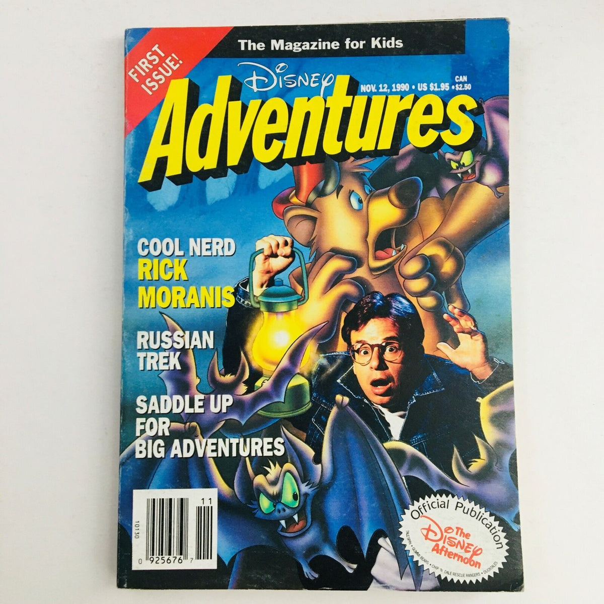 Disney Adventures Magazine November 12 1990 featuring Rick Moranis on the cover, showcasing vibrant illustrations and text emphasizing children's adventures and pop culture from the 90s.