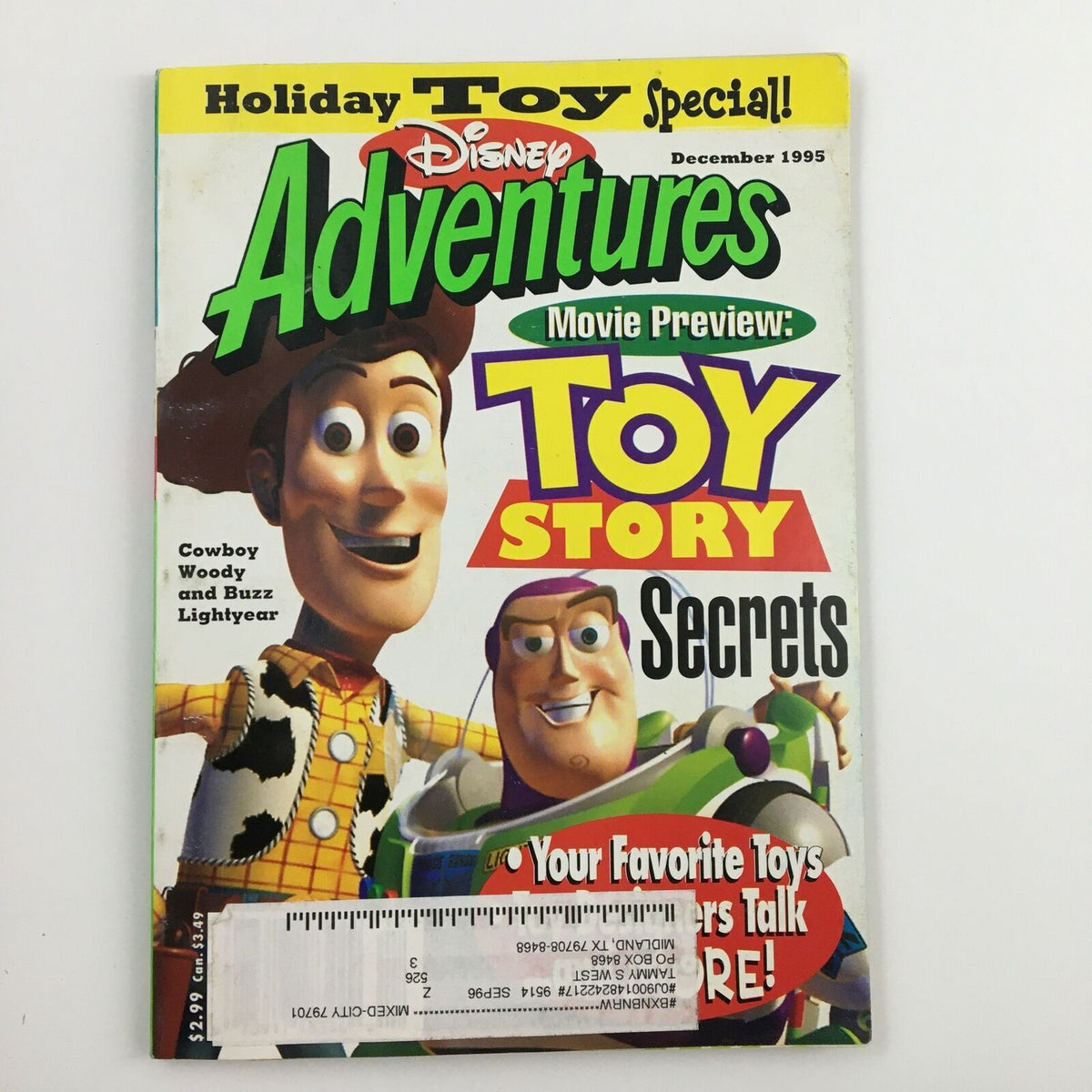 Disney Adventures Magazine December 1995 cover featuring Cowboy Woody and Buzz Lightyear from Toy Story, highlighting movie preview secrets and toy special features.