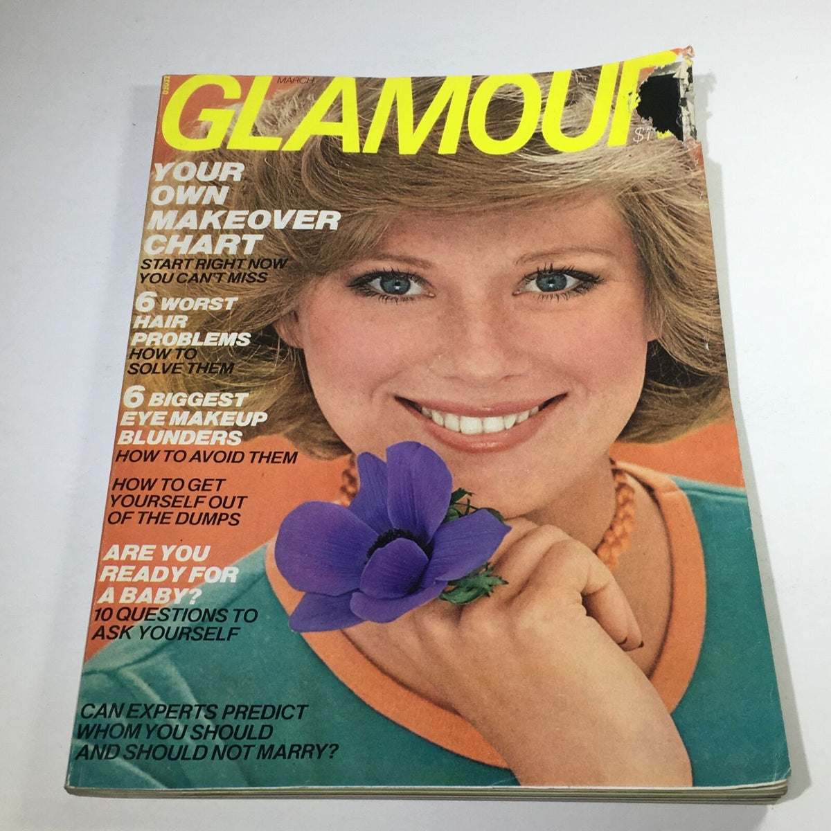 Vintage Glamour Magazine from March 1976 featuring Shaun Casey on the cover, showcasing her cheerful smile and blue eyes. The magazine highlights various articles, including makeup tips and lifestyle advice, capturing the essence of 1970s fashion and culture.