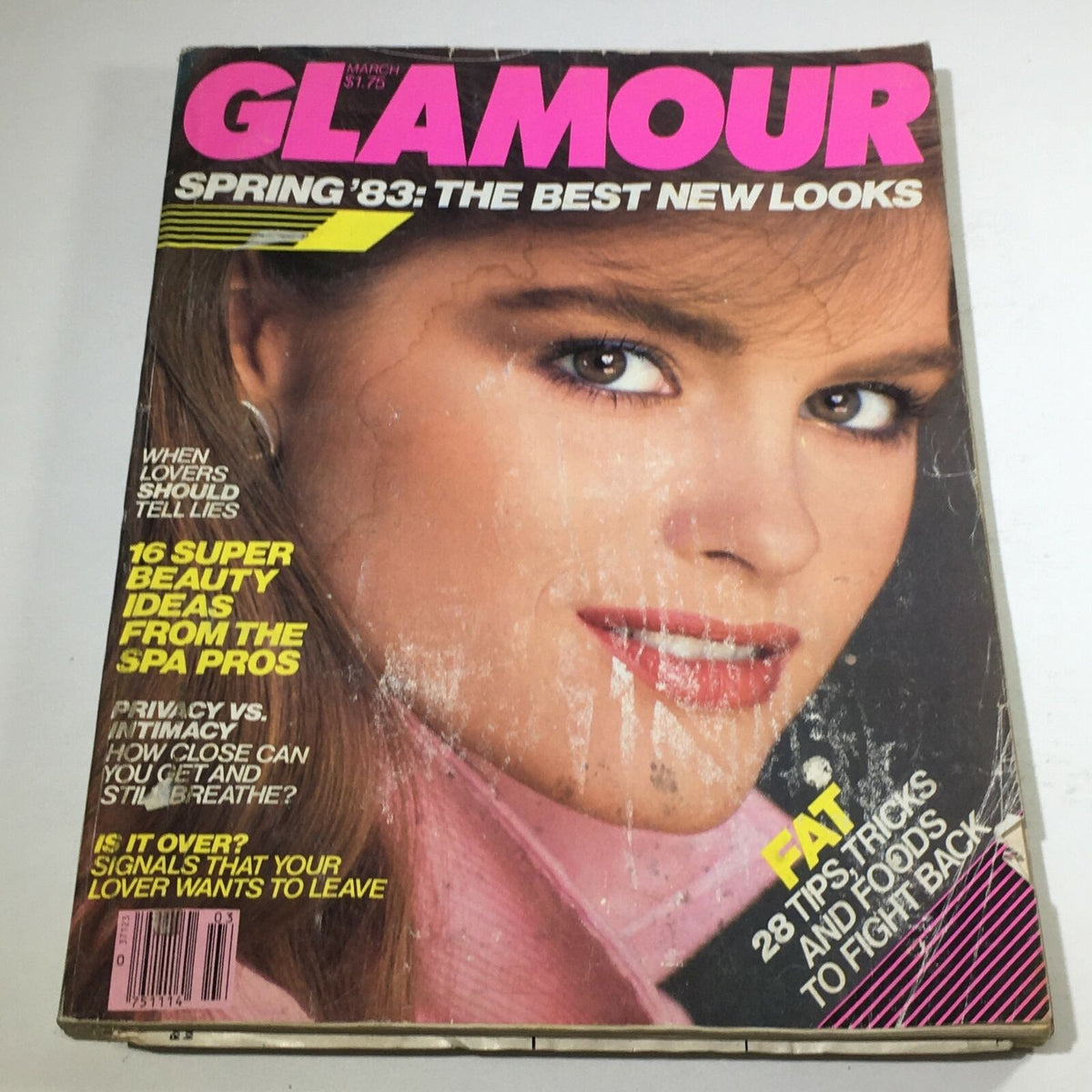 Cover of VTG Glamour Magazine: March 1983 featuring Jacki Adams with a focus on the bold title 'GLAMOUR' and highlighted articles on beauty trends and relationships, encapsulating the early 1980s fashion and culture.