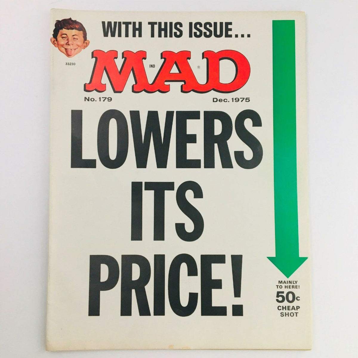 Cover of Mad Magazine December 1975 No. 179 featuring the headline 'Lowers Its Price!' with bold font and an illustration of Alfred E. Neuman.