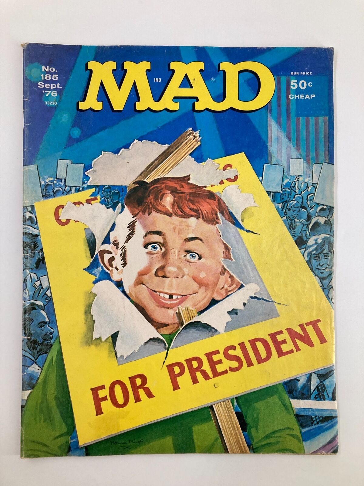 Mad Magazine September 1976 No. 185 cover featuring Alfred E. Neuman with a sign that reads 'FOR PRESIDENT', highlighting the magazine's satirical take on the political climate of the '70s.