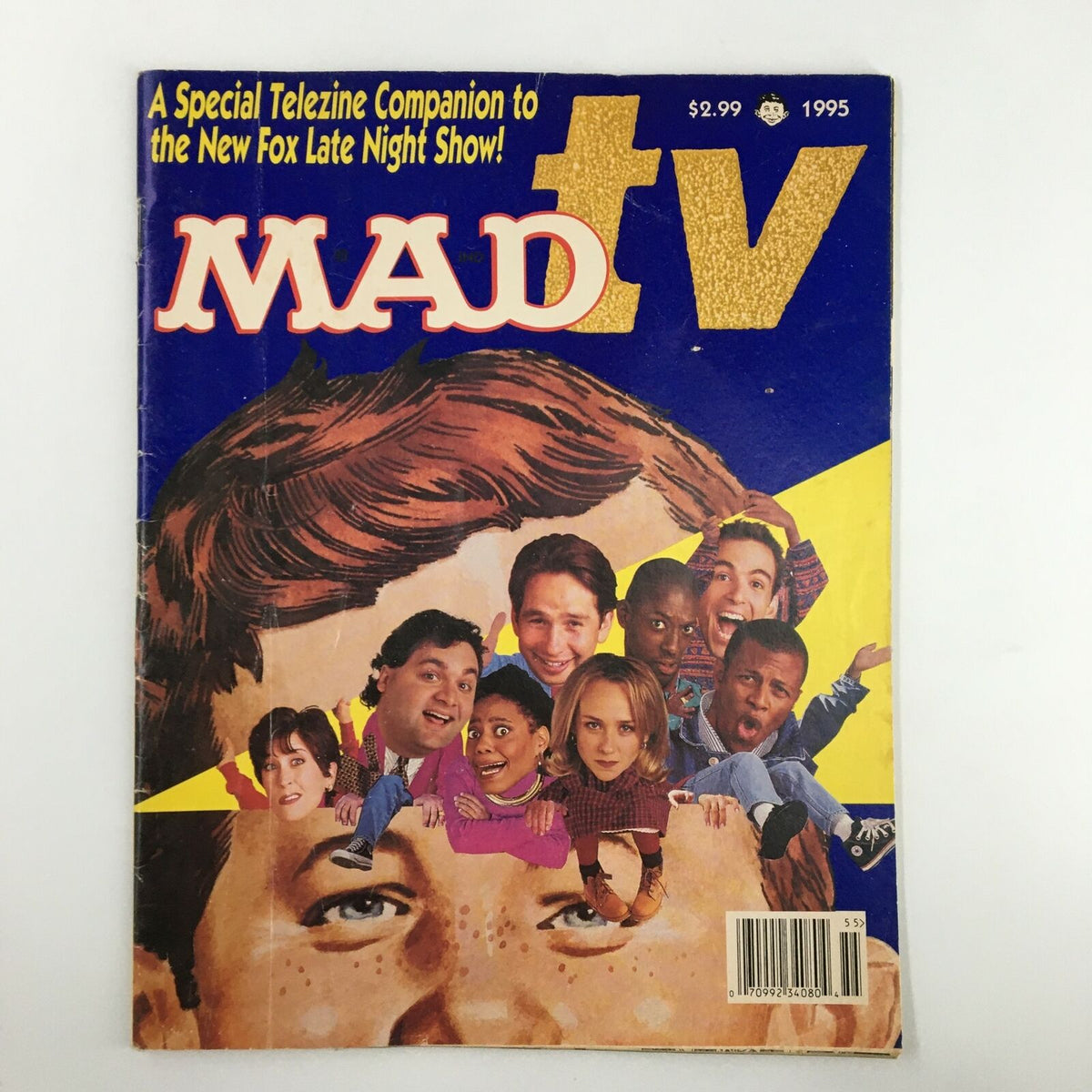 Cover of Mad Magazine 1995 Companion to The New Fox Late Night Show featuring colorful graphics and a collage of comedic characters from the era, highlighting the humor and entertainment of the mid-'90s.
