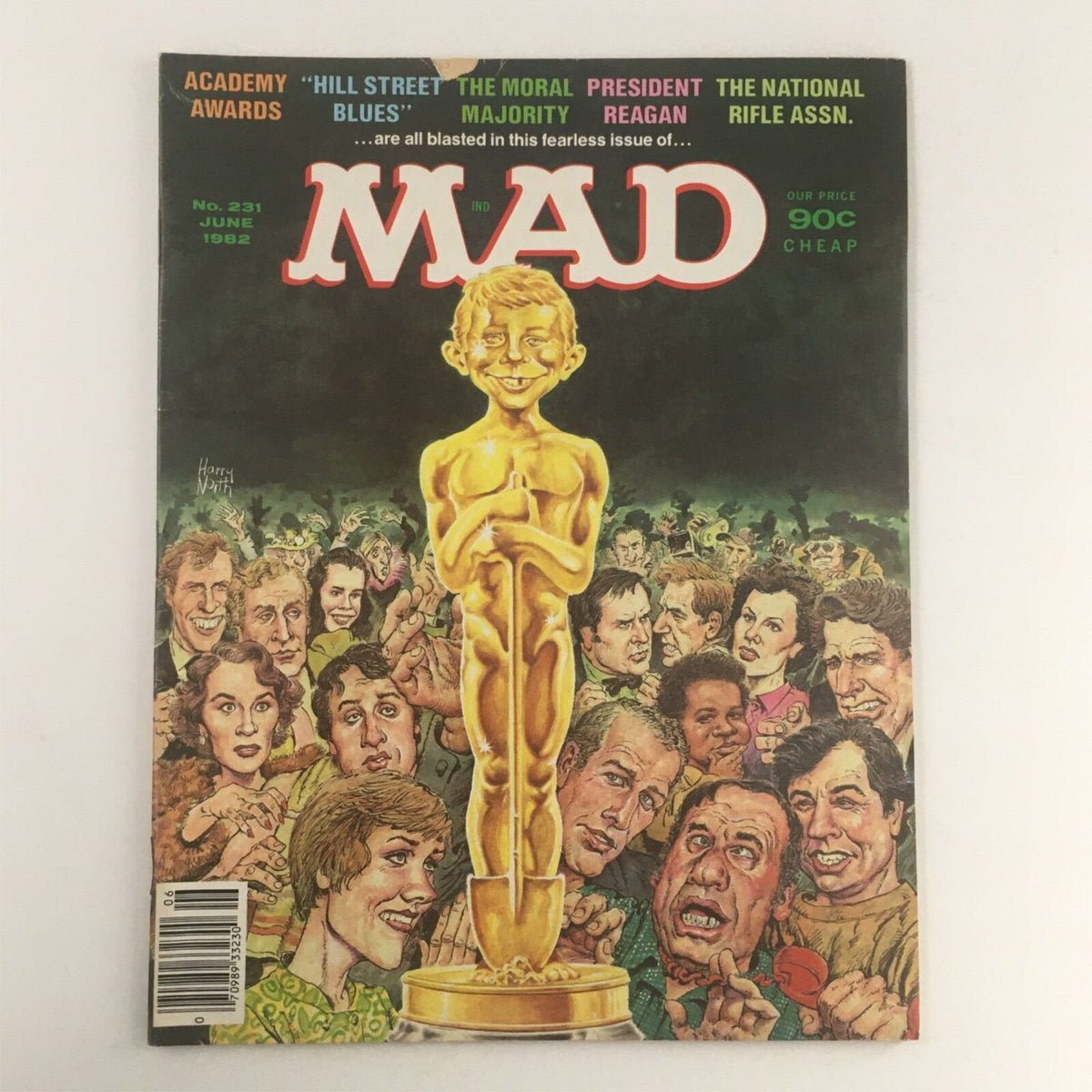 Cover of Mad Magazine June 1982 No. 231 featuring a caricature of a golden Oscar statue surrounded by humorous depictions of celebrities, highlighting the Academy Awards with a comedic twist. VG condition.