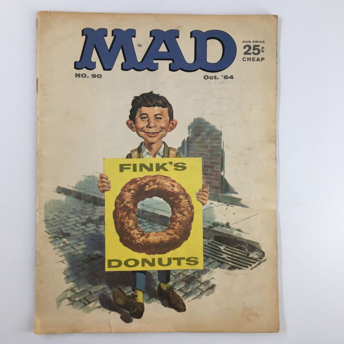 Cover of Mad Magazine October 1964 No. 90 featuring Alfred E. Neuman holding a Fink's Donut sign, showcasing vintage comic artwork and humor.