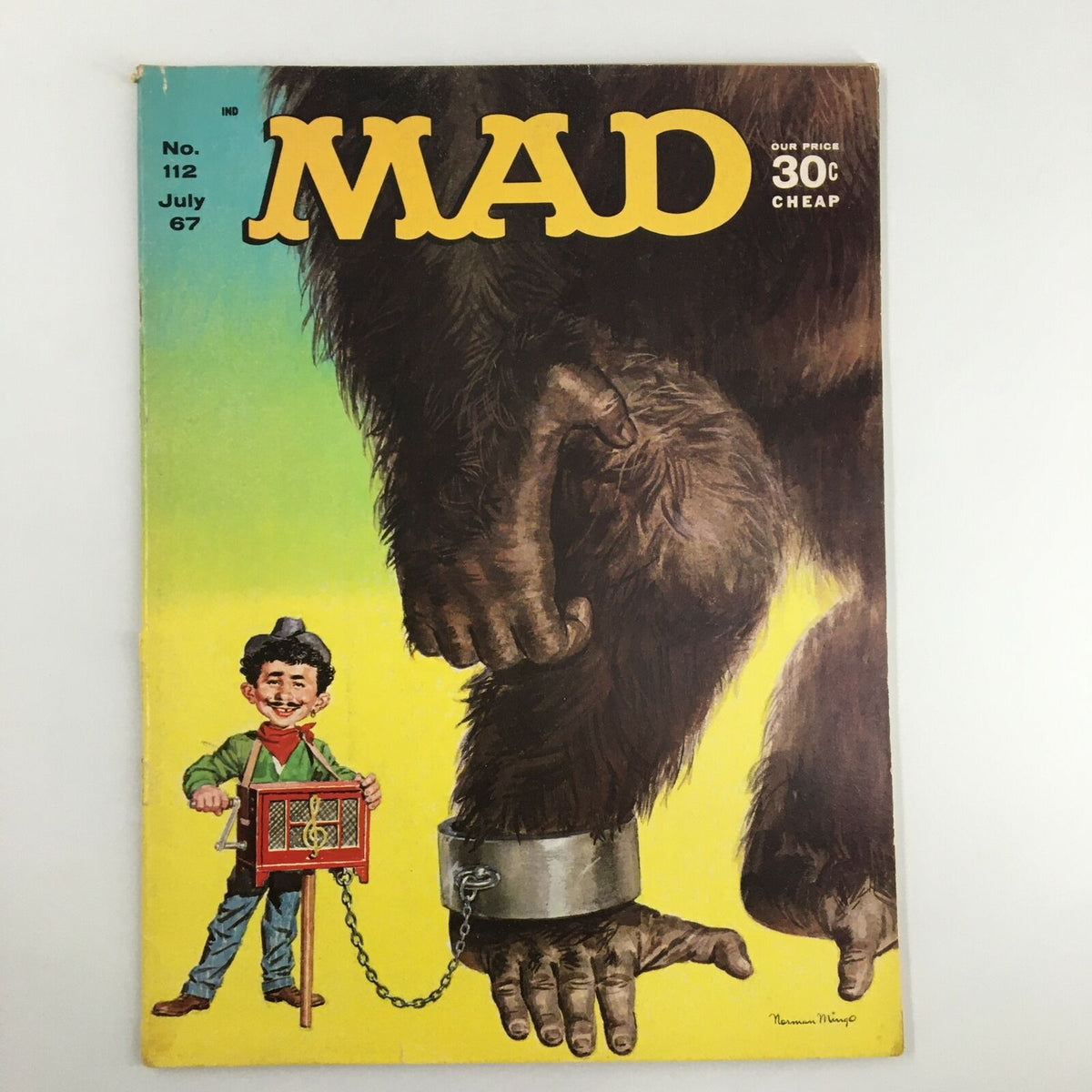 Mad Magazine July 1967 No. 112 featuring Alfred E. Neuman as an organ grinder with a giant gorilla, showcasing classic comic art and humor.