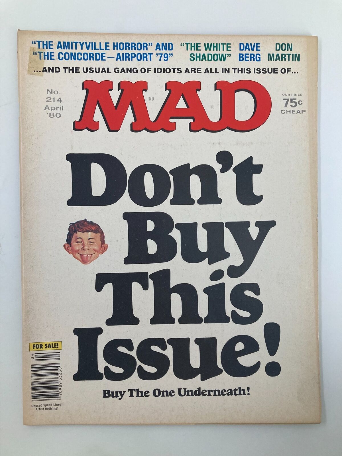 Cover of Mad Magazine April 1980 No. 214 featuring the satirical headline 'Don't Buy This Issue!' with iconic artwork and humorous elements. This vintage magazine showcases the classic humor of Mad Magazine, making it a collectible item.