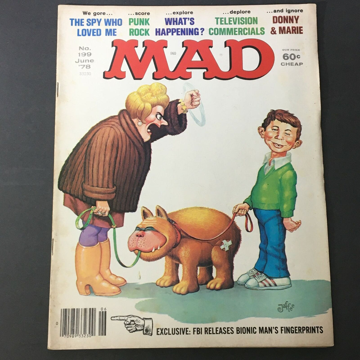 Cover of Mad #199 from June 1978 featuring characters walking a dog, with a humorous twist. The issue includes references to 'The Spy Who Loved Me,' 'Donny & Marie,' and various pop culture elements. Magazine priced at 60 cents.