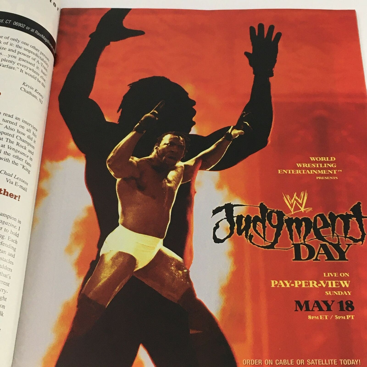 Promotional page in WWE Raw Magazine May 2003 for Judgement Day Pay-Per-View, featuring a silhouetted wrestler emphasizing the event's anticipation.