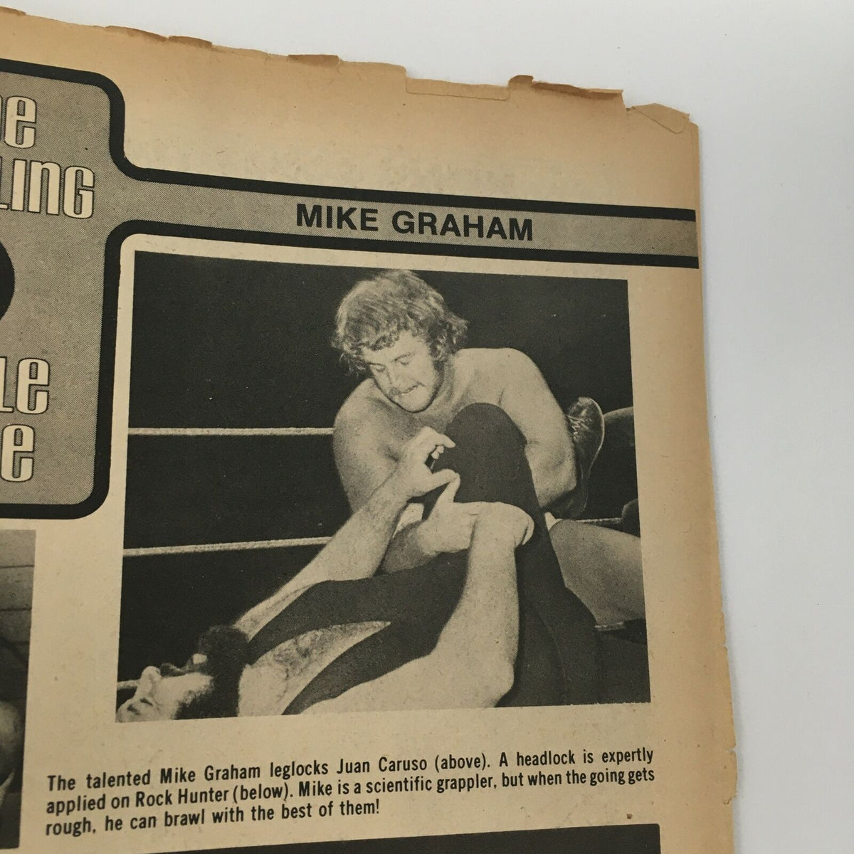 Inside Wrestling Magazine March 1977 featuring Mike Graham showcasing a leglock on Juan Caruso. This image captures a pivotal wrestling moment in professional wrestling history.