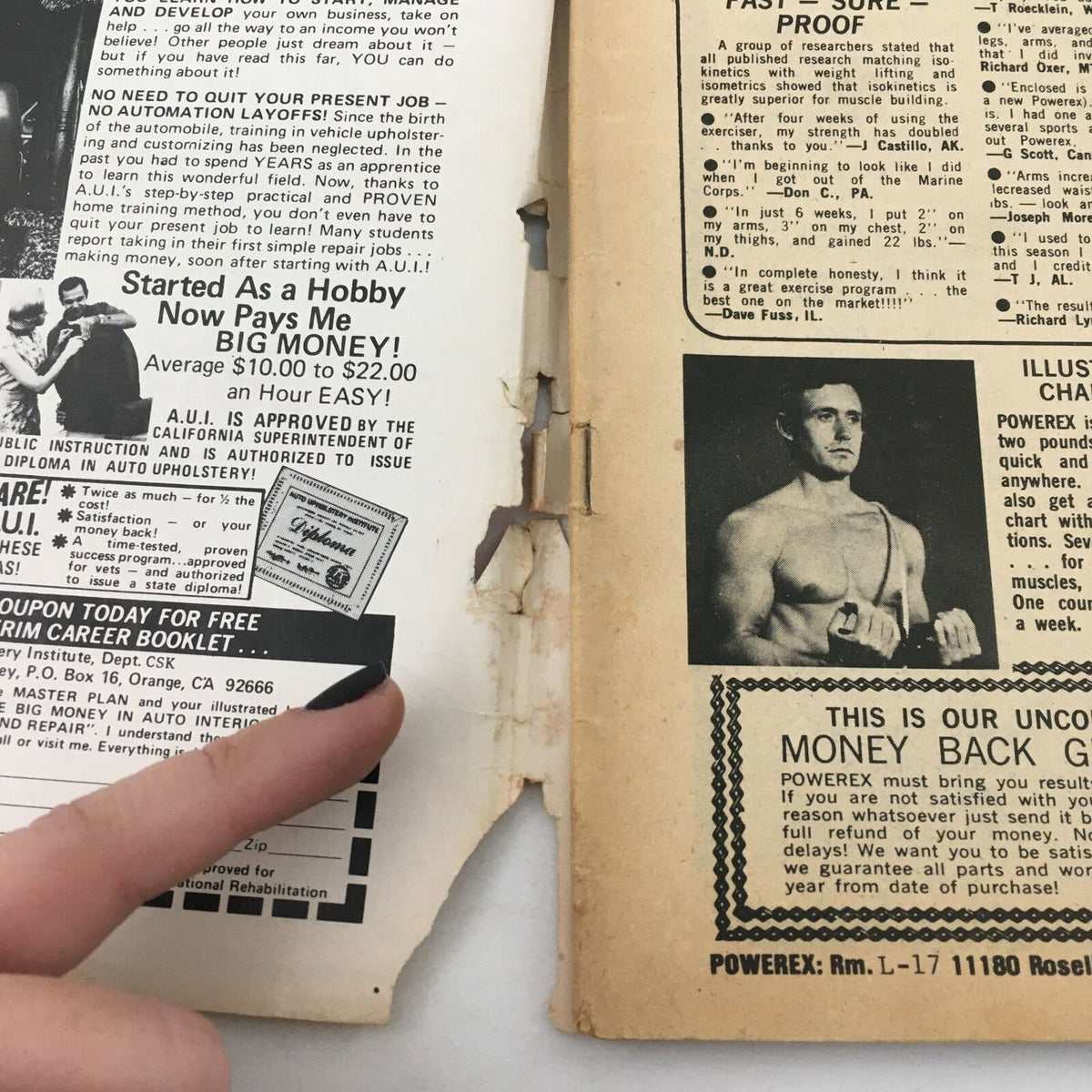 Inside cover of Inside Wrestling Magazine March 1977 displaying an advertisement for home jobs and training programs, with a finger indicating a section of interest.