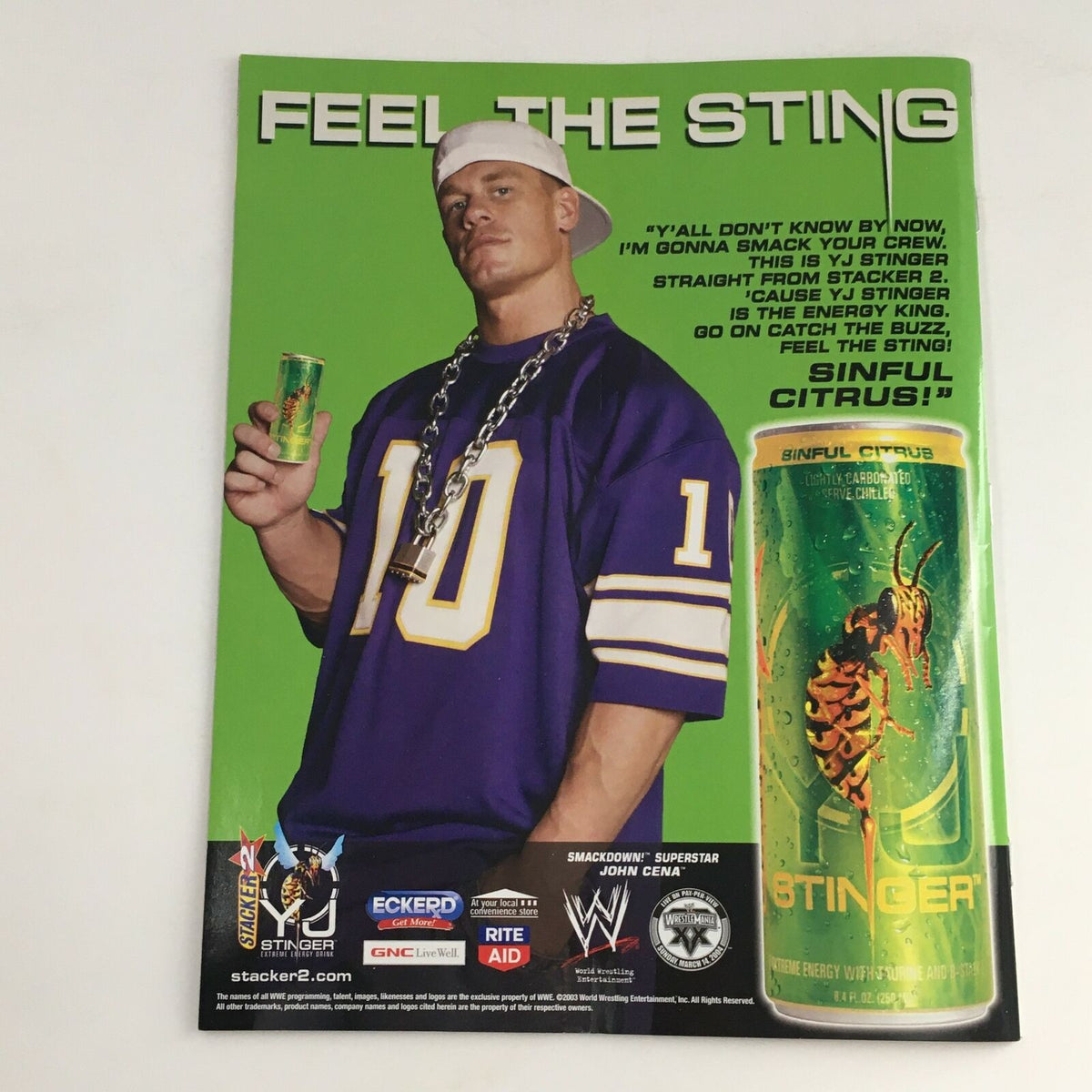Back cover of WWE Raw Magazine February 2004 featuring John Cena promoting Stinger energy drink, emphasizing wrestling's marketing collaborations.