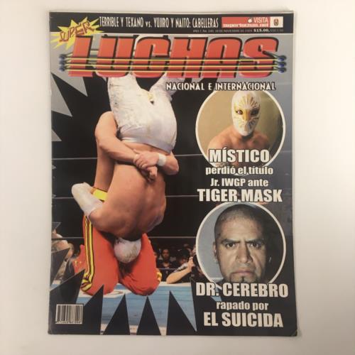 Cover of Super Luchas Magazine November 2009 featuring Místico and Tiger Mask in a wrestling match, highlighting a dramatic moment with Dr. Cerebro and El Suicida.
