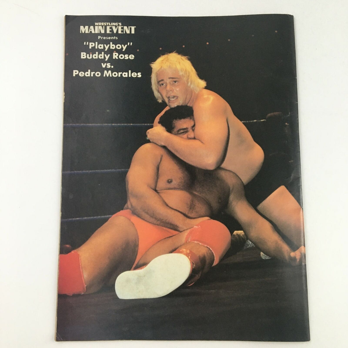 Wrestling's Main Event December 1983 featuring a match between Playboy Buddy Rose and Pedro Morales, highlighting the intense action and rivalry in professional wrestling.