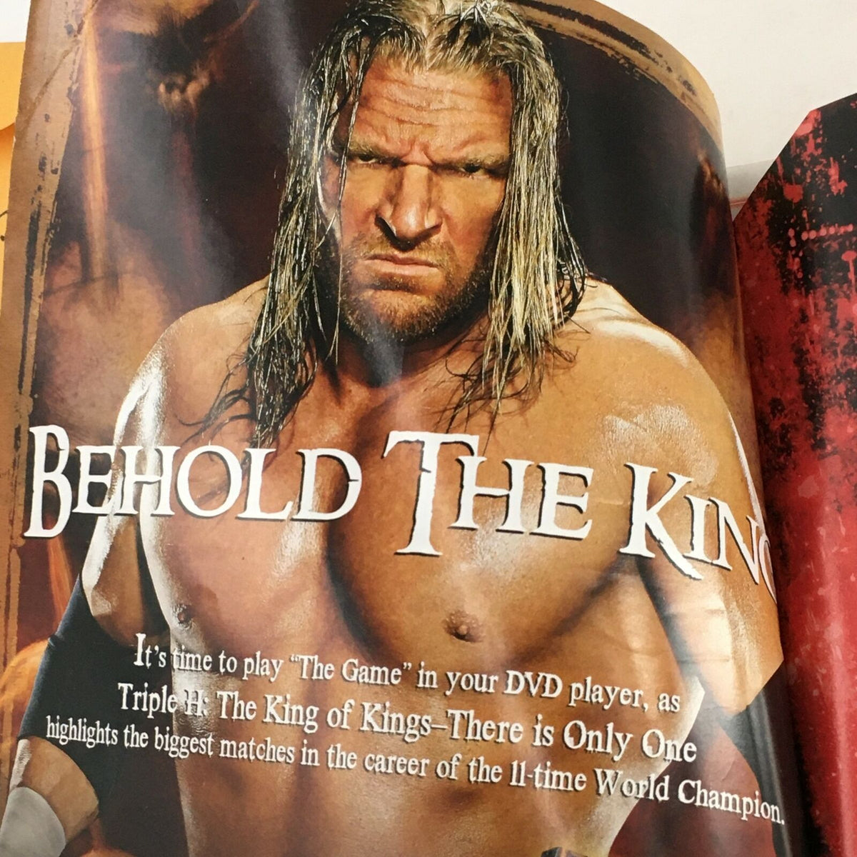 Page from WWE Magazine 2008 highlighting Triple H as 'The King of Kings', emphasizing his significant matches and career in wrestling.