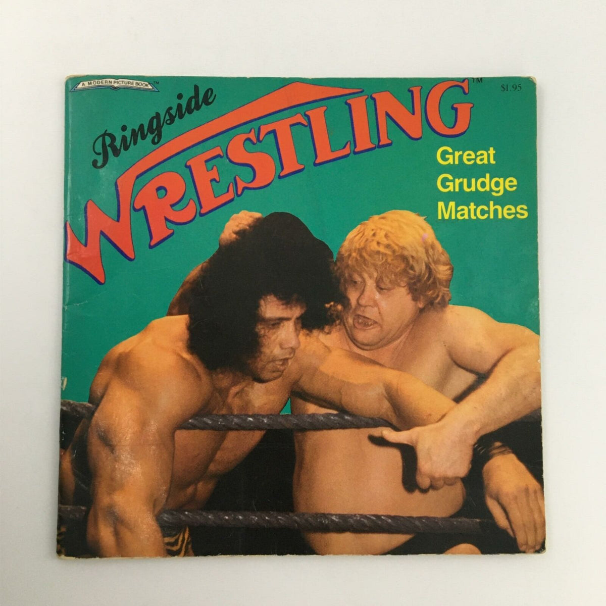 Ringside Wrestling Book Great Grudge Match featuring wrestlers in action, showcasing dramatic scenes from wrestling matches.