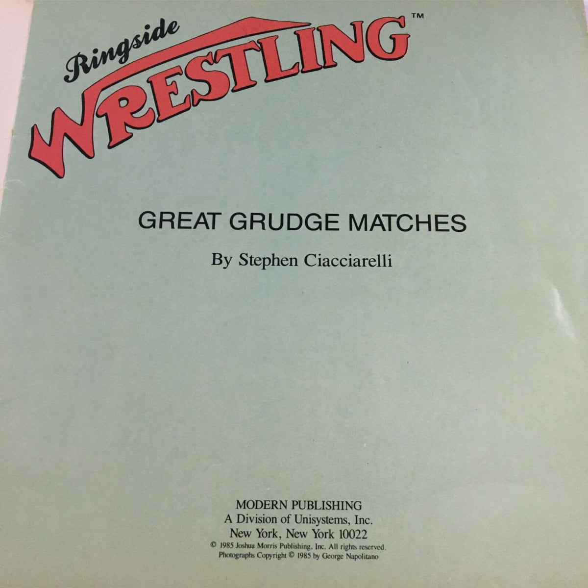 Back cover of Ringside Wrestling Book Great Grudge Match, highlighting the title and author Stephen Ciacciarelli against a pastel blue background.
