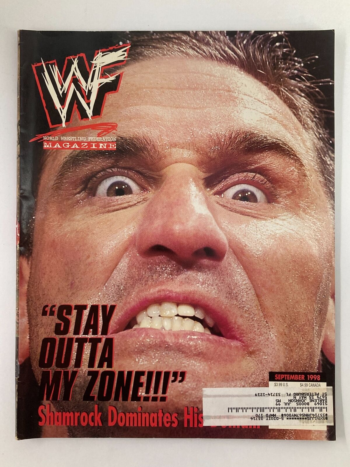 WWF Magazine September 1998 Cover, Volume 17 #9 featuring Ken Shamrock with the quote 'STAY OUTTA MY ZONE!!!' capturing the intensity of professional wrestling.