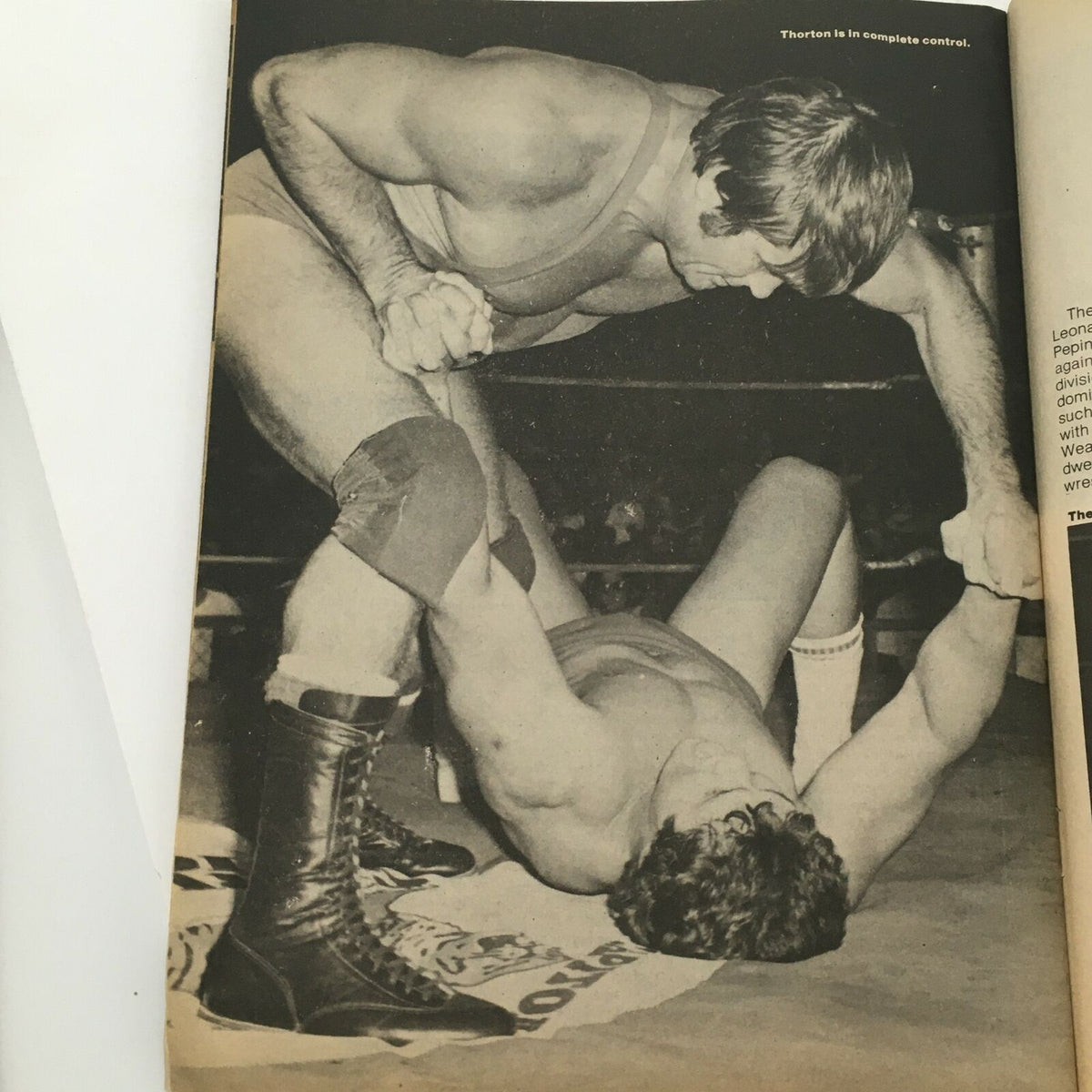 Wrestling Today Magazine January 1981 photograph depicting a wrestling competition, highlighting physical technique and athleticism.