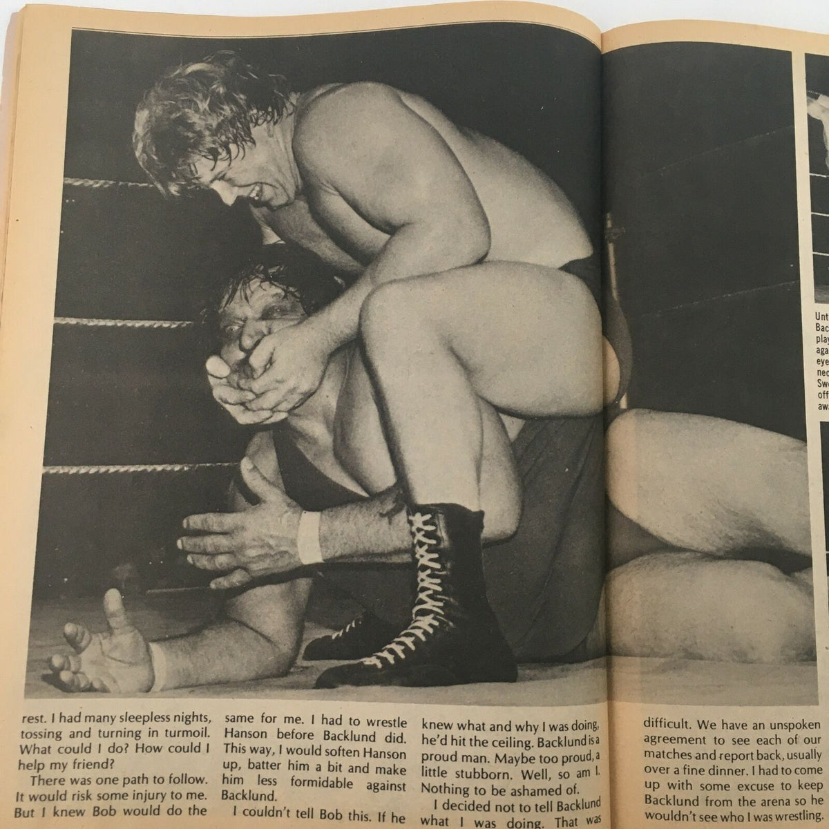 Inside The Wrestler Magazine February 1980, a dramatic wrestling scene unfolds with a wrestler applying a hold on another, emphasizing the intense rivalries of the time, including insights into Bob Backlund's strategies.