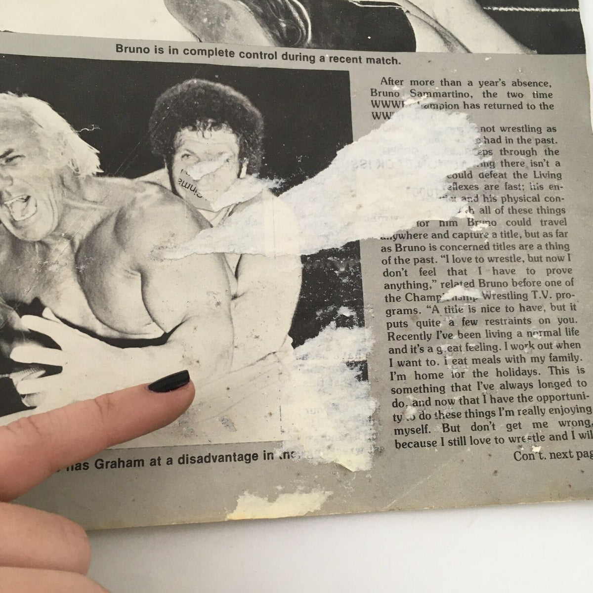 Interior page from Wrestling Action Magazine Vol 1 #4, illustrating a wrestling scene with notable damage, reflecting the magazine's vintage condition.
