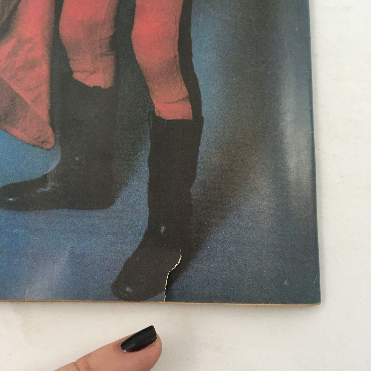 Detail of The Ring's Wrestling Magazine February 1981 featuring a close-up view of page showcasing wrestlers in boots, emphasizing the vintage style and historical significance of this collectible magazine.