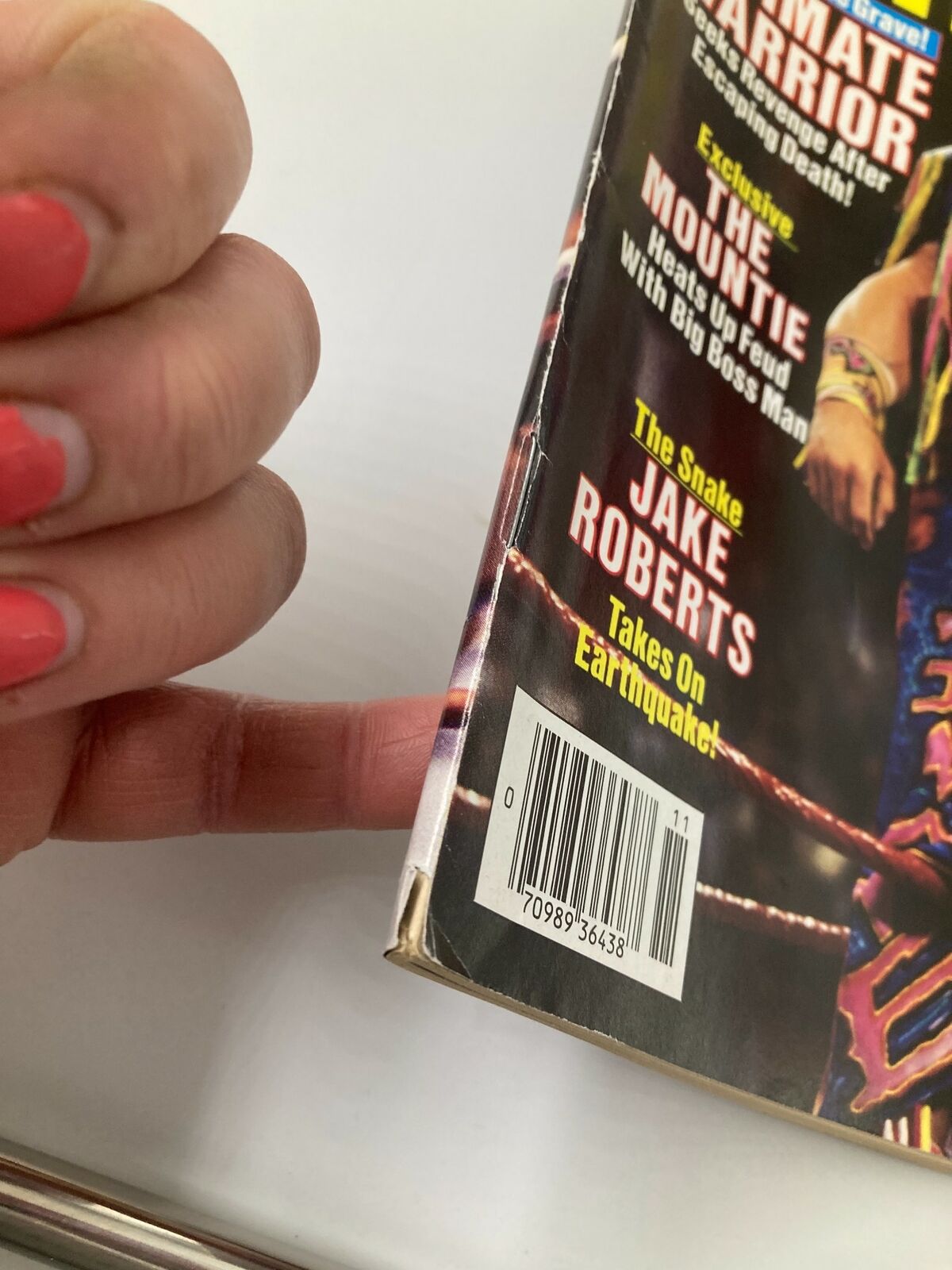 Close-up view of the edge of the November 1991 Wrestling World Magazine, highlighting the barcode and condition details of the vintage wrestling publication.