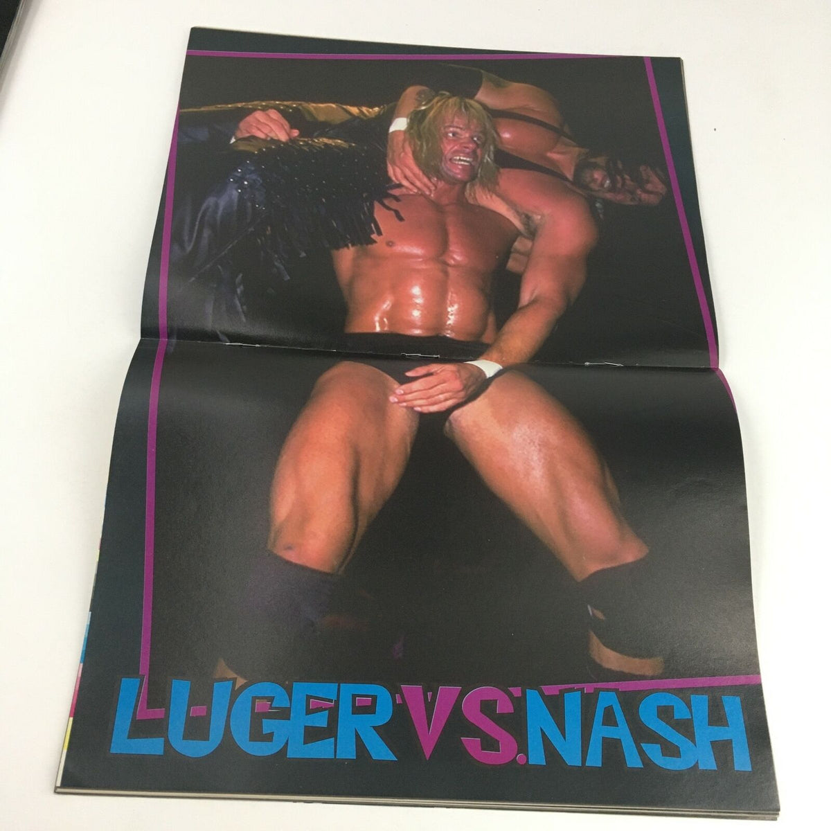 Ringside Wrestling Magazine September 1997 featuring Lex Luger versus Kevin Nash poster. A vintage wrestling collectible showcasing iconic wrestlers in action.