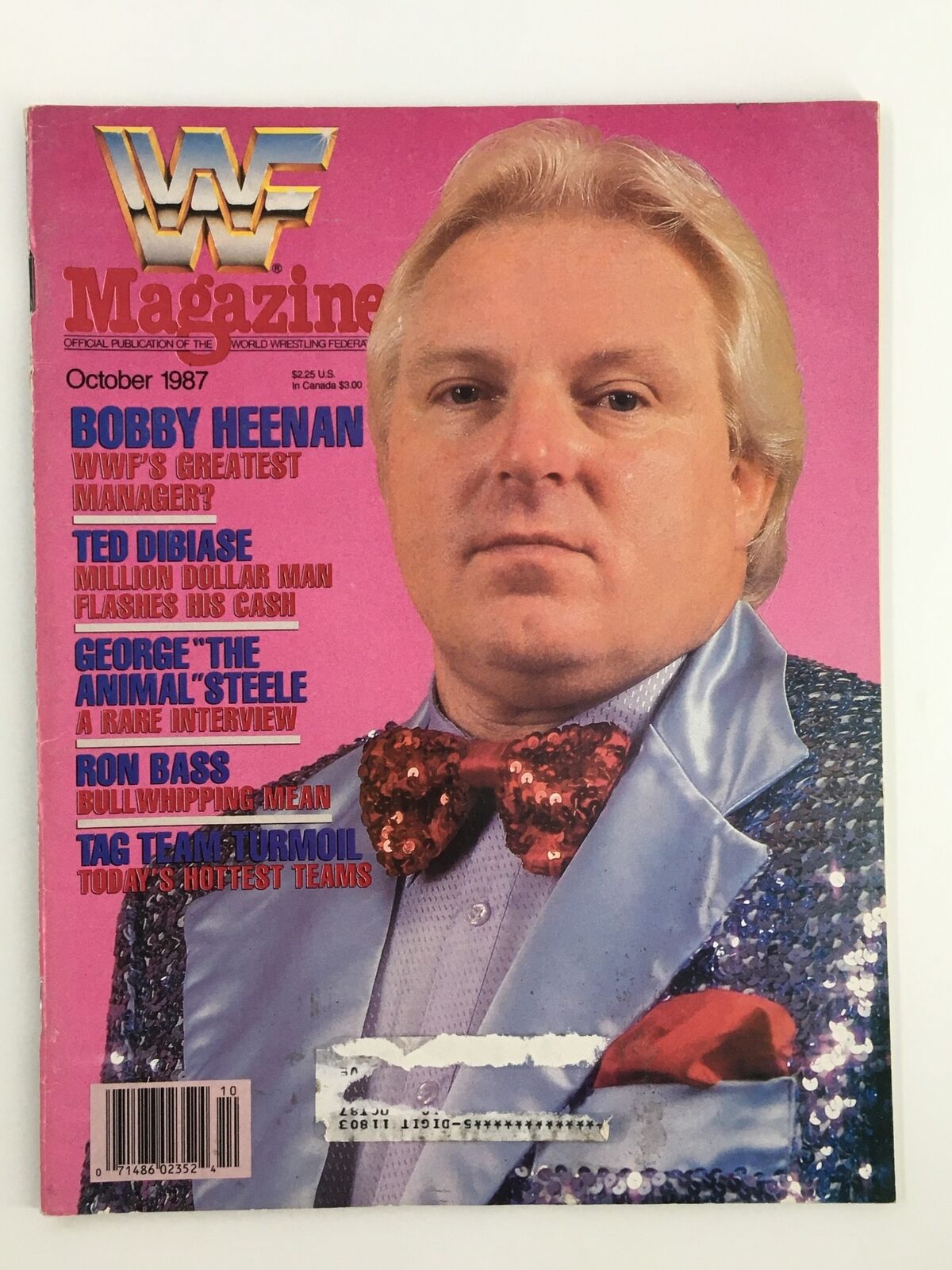 Cover of VTG WWF Magazine October 1987 featuring Bobby Heenan, Ted Dibiase, and The Animal, showcasing wrestling history with vibrant colors and engaging titles.