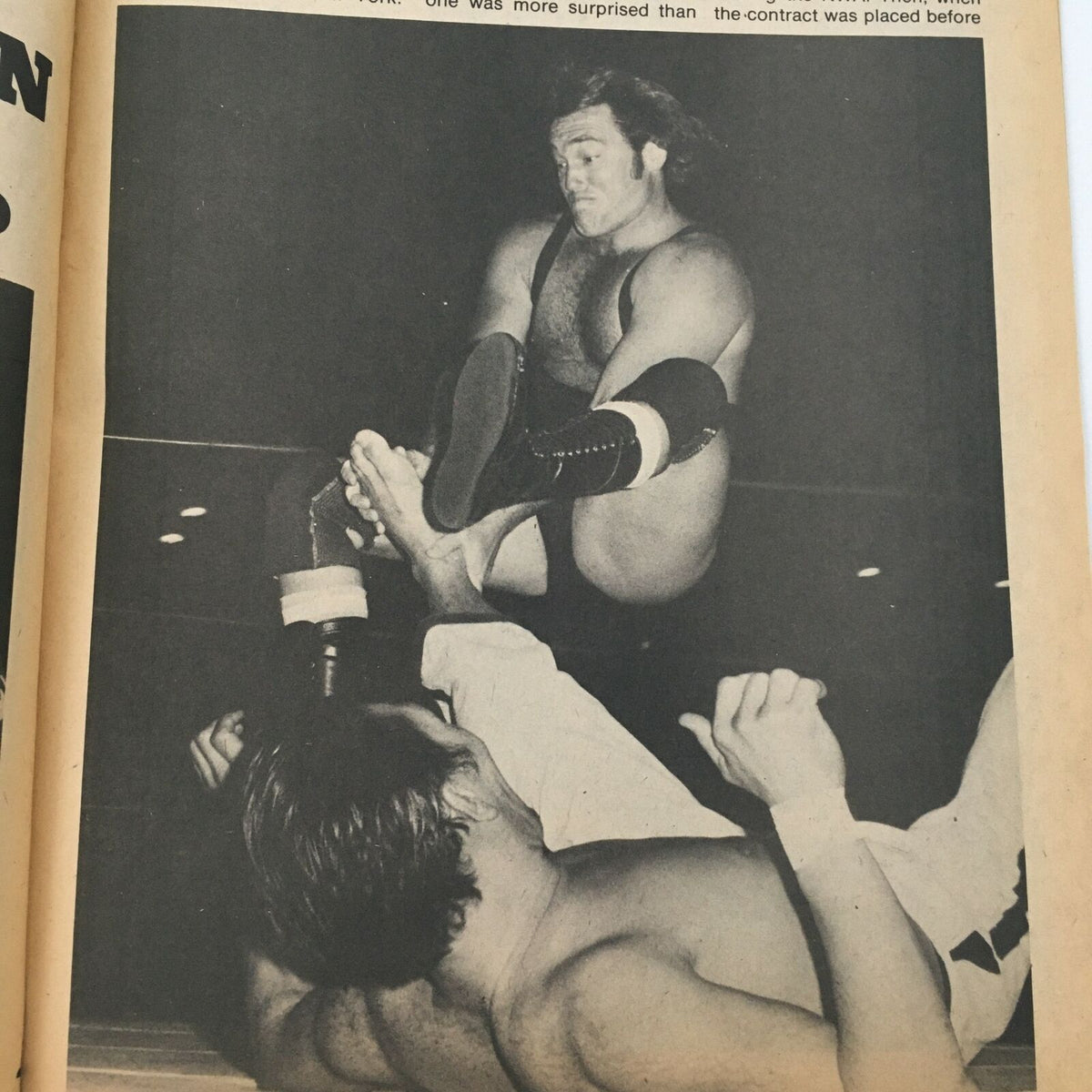 Action shot from Inside Wrestling Magazine, June 1980, featuring a wrestling match with a wrestler jumping over his opponent.