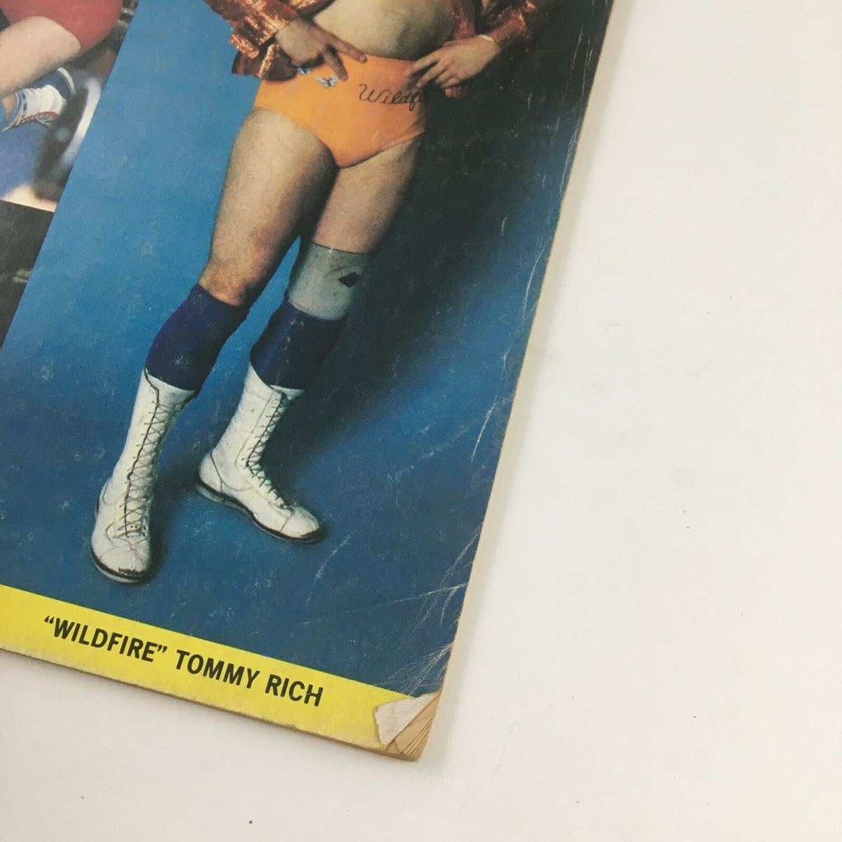 Close-up of The Ring's Wrestling Magazine February 1981 cover featuring 'Wildfire' Tommy Rich, highlighting the vintage wrestling theme.