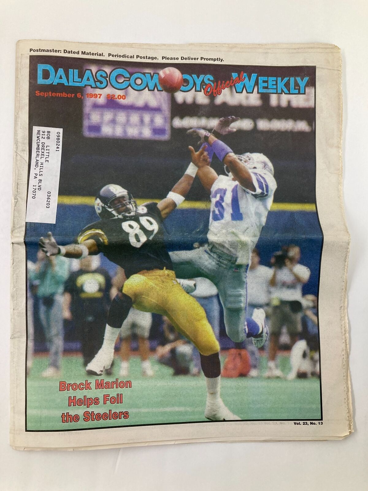 Dallas Cowboys Weekly Newspaper September 6 1997 Vol 23 #13 featuring Brock Marion on the cover, showcasing a significant play against the Pittsburgh Steelers.