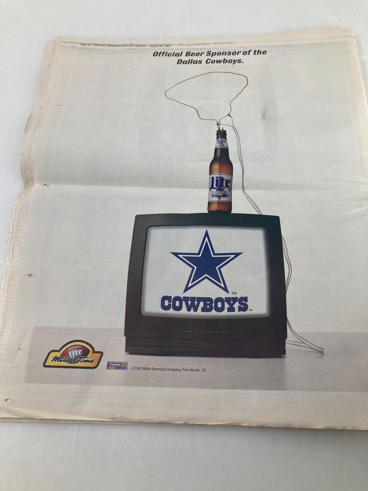 Advertisement in Dallas Cowboys Weekly Newspaper August 23, 1997 Vol 23 #11 showcasing Miller Beer as the official sponsor of the Dallas Cowboys.