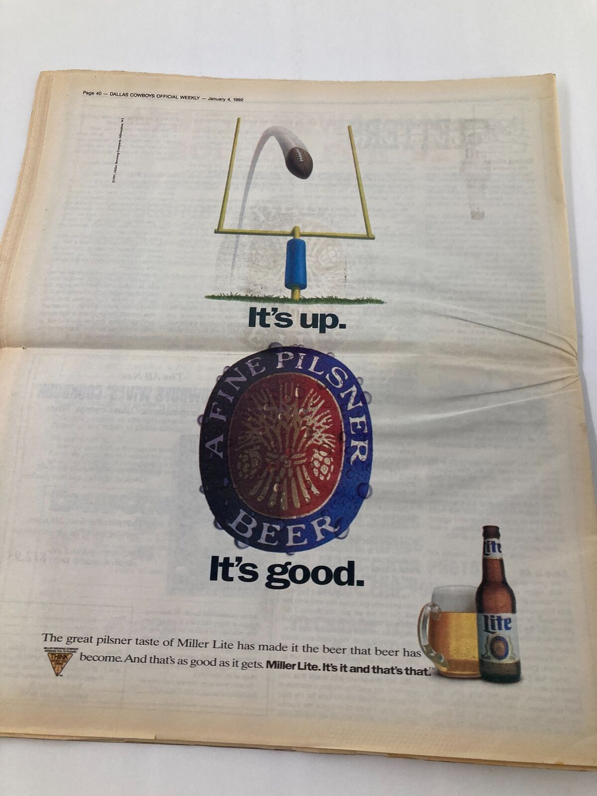Dallas Cowboys Weekly Newspaper January 4 1992 Vol 17 #30 Jimmie Jones showing an advertisement for Miller Lite beer, promoting its pilsner taste.