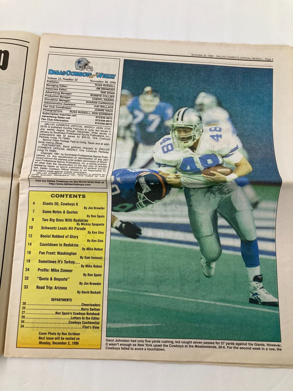 Inside spread of the Dallas Cowboys Weekly Newspaper November 30 1996 Vol 22 #25, highlights Daryl Johnston's involvement in the game, providing a glimpse of the Cowboys' roster and game details.