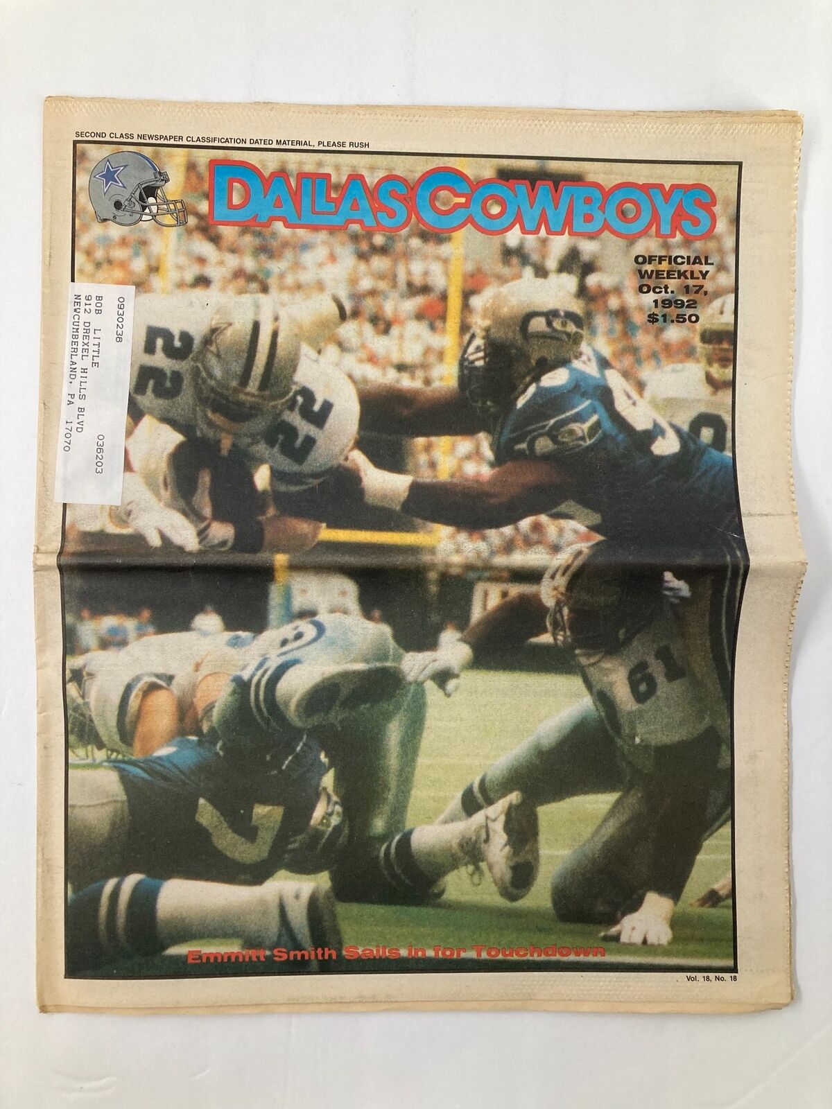 Dallas Cowboys Weekly Newspaper from October 17, 1992, Volume 18 #18 featuring Emmitt Smith. The cover shows a dramatic football action scene with players competing on the field.