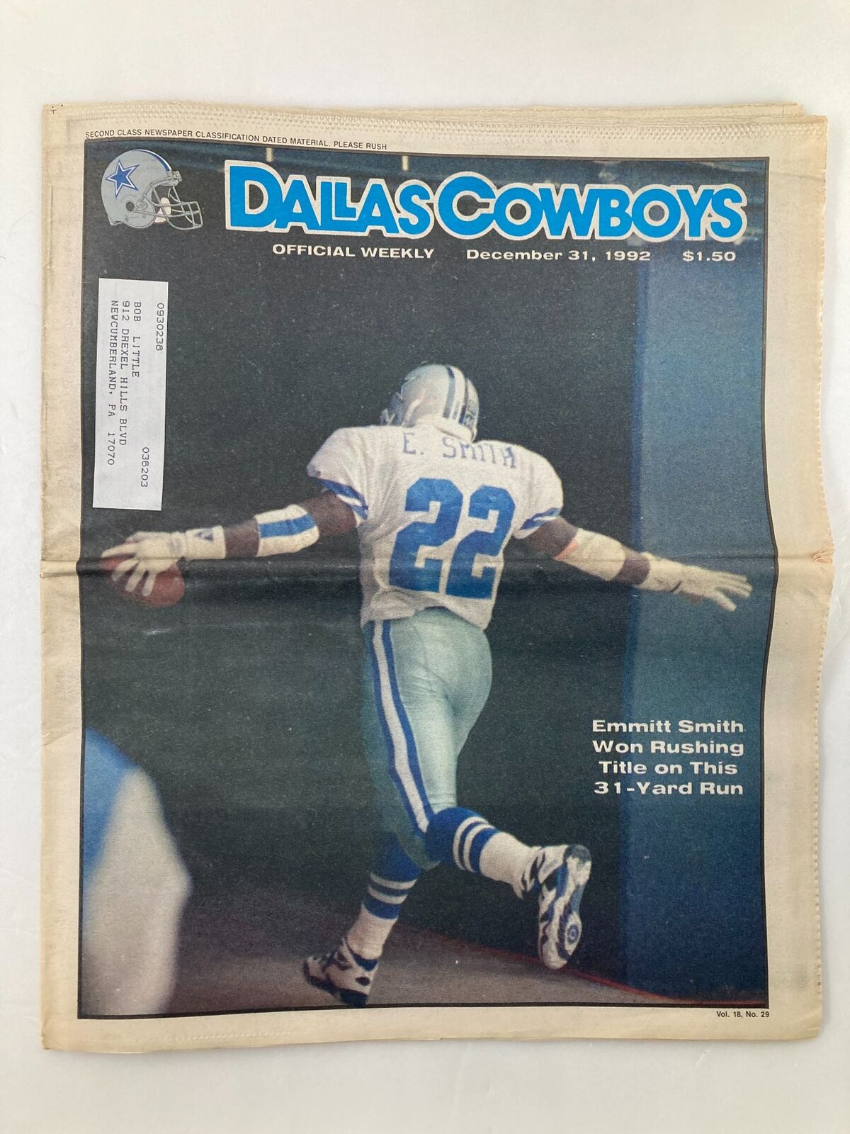 Dallas Cowboys Weekly Newspaper December 31 1992 featuring Emmitt Smith, showcasing him celebrating after winning the rushing title on a 31-yard run. The newspaper highlights the iconic moment in Cowboys history.