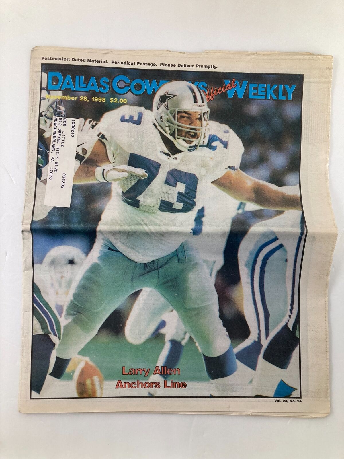 Dallas Cowboys Weekly Newspaper November 28 1998 Vol 24 #24 featuring Larry Allen making a play on the field, showcasing the offensive line with good condition and protective covering.