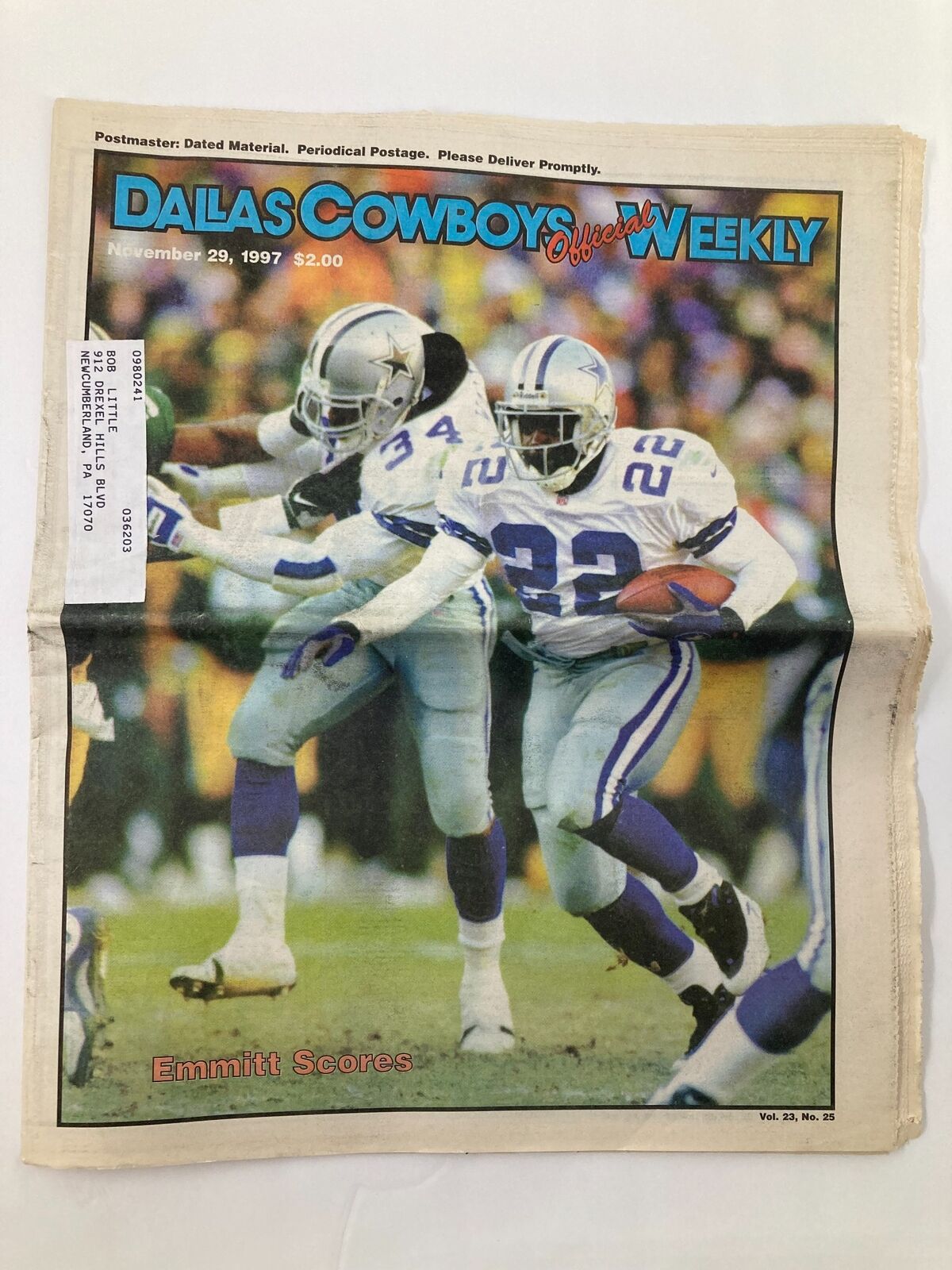 Dallas Cowboys Weekly Newspaper cover from November 29, 1997, Volume 23 #25, showcasing Emmitt Smith in action.