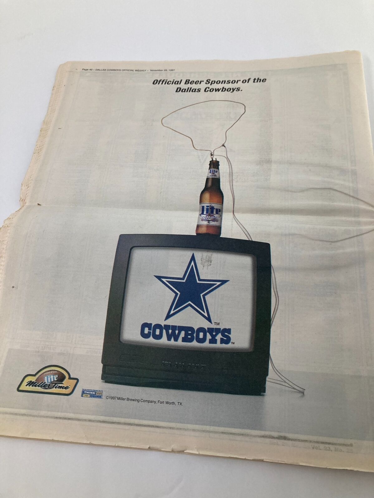 Advertisement for Miller Beer featuring the Dallas Cowboys, from the Dallas Cowboys Weekly Newspaper November 29 1997, Vol 23 #25 Emmitt Smith Scores.