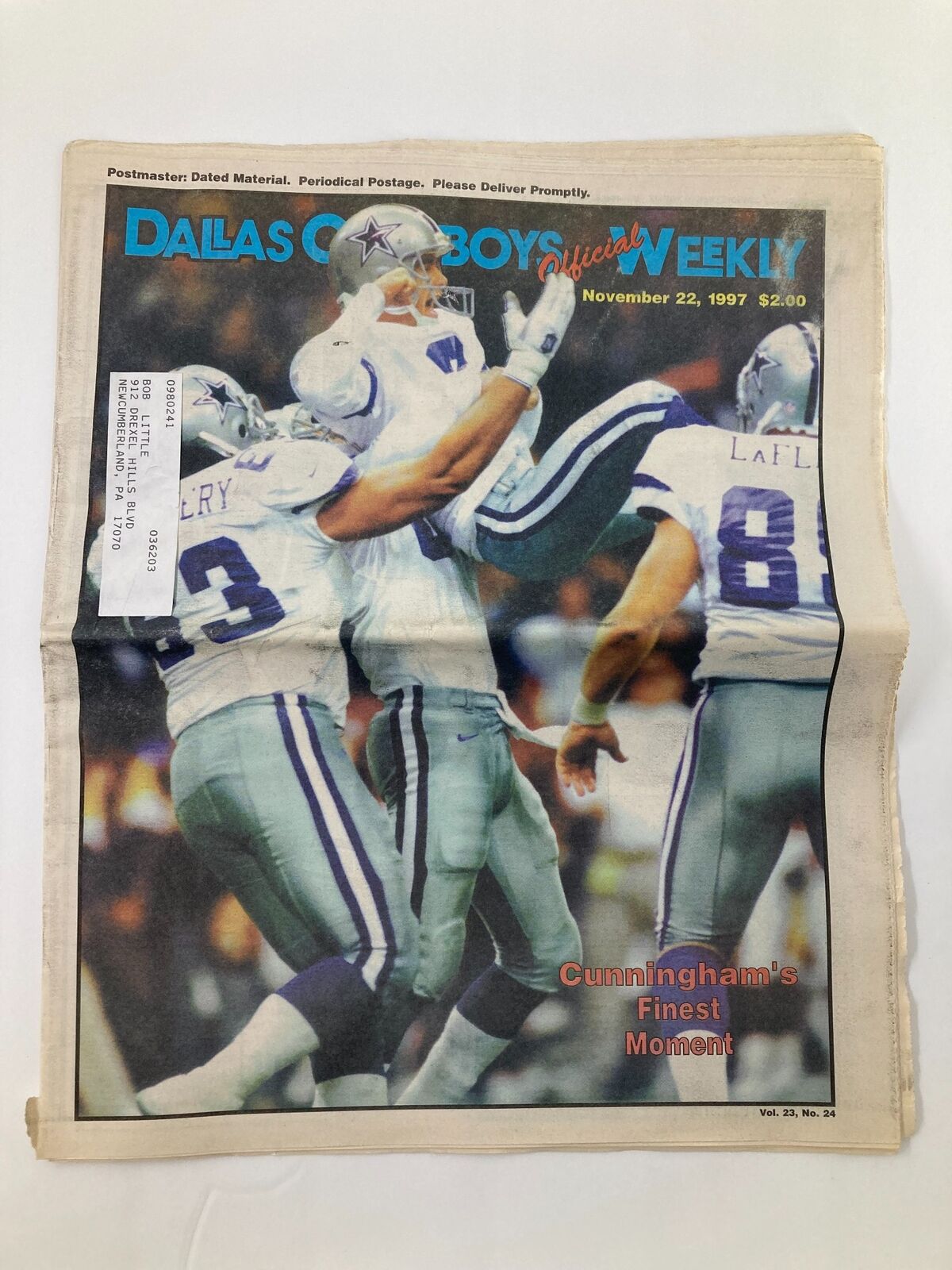 Dallas Cowboys Weekly Newspaper November 22 1997 Vol 23 #24 featuring Randall Cunningham celebrating during a game, showcasing Cunningham's finest moment on the cover.