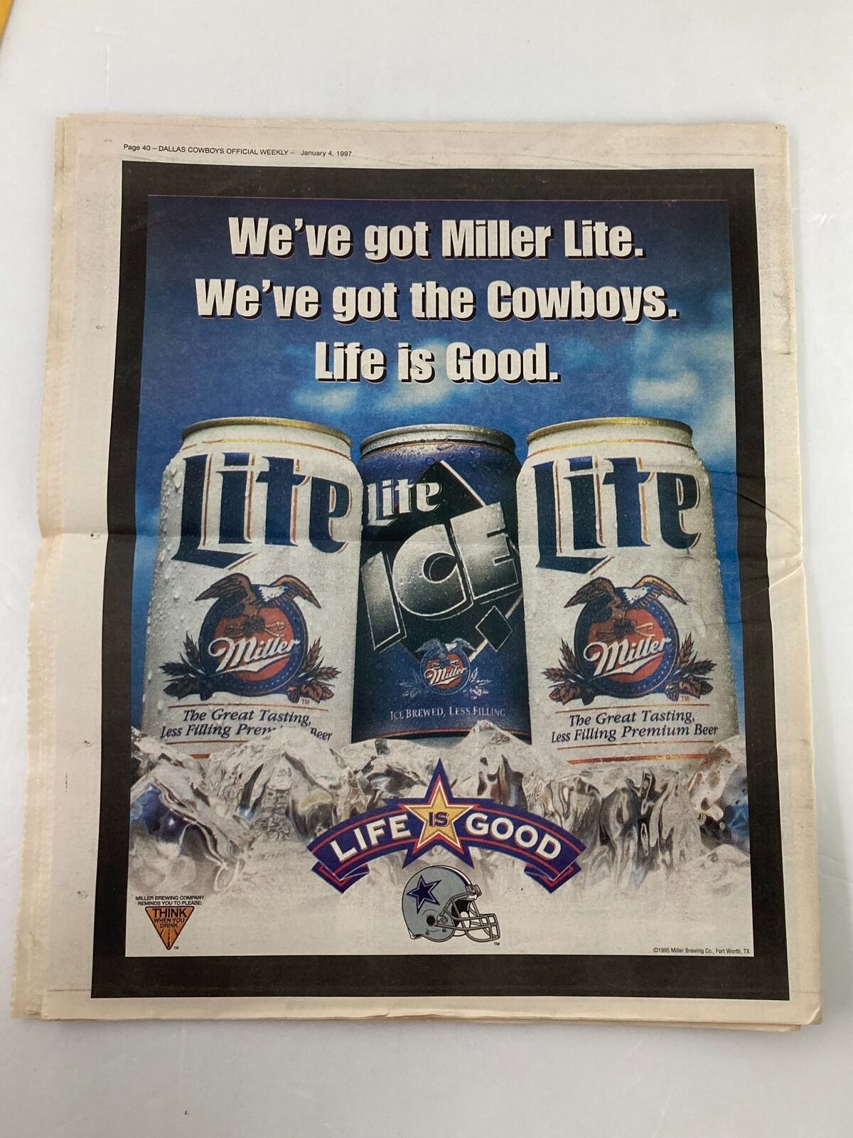 Advertisement page from the Dallas Cowboys Weekly Newspaper January 4 1997 Vol 22 #30 promoting Miller Lite beer, highlighting a connection with the Cowboys and promoting the lifestyle of fans.