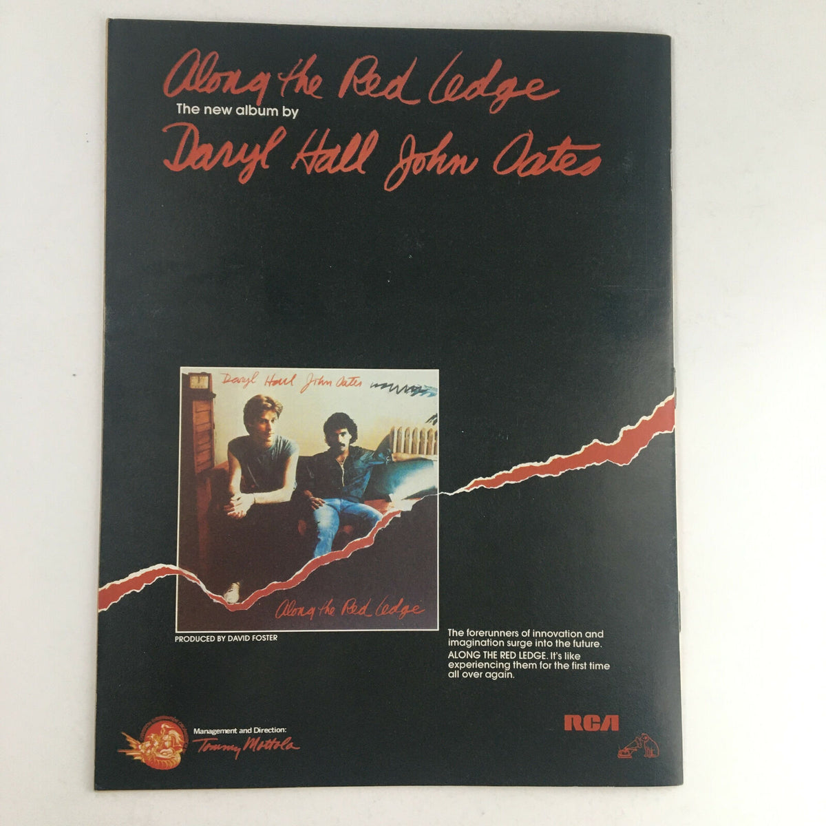 Advertisement for Daryl Hall and John Oates' album 'Along the Red Ledge' featured in Circus Magazine, October 3, 1978. Highlights the duo's artistic collaboration.
