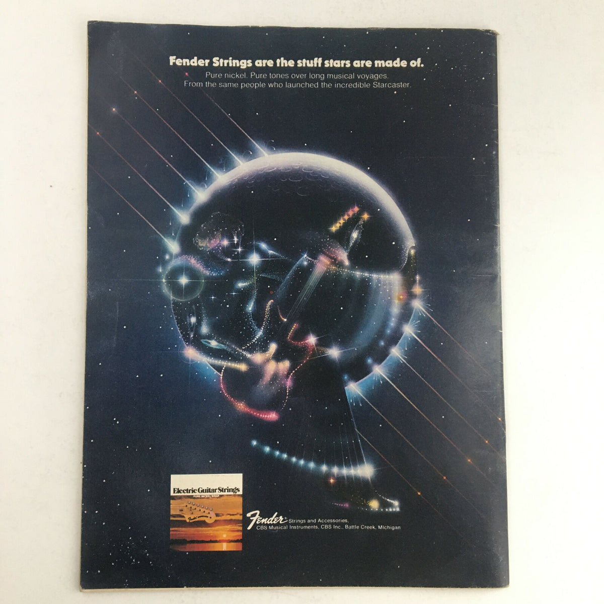 Fender advertisement on the back cover of Circus Magazine March 17 1977, promoting electric guitar strings with a cosmic design.