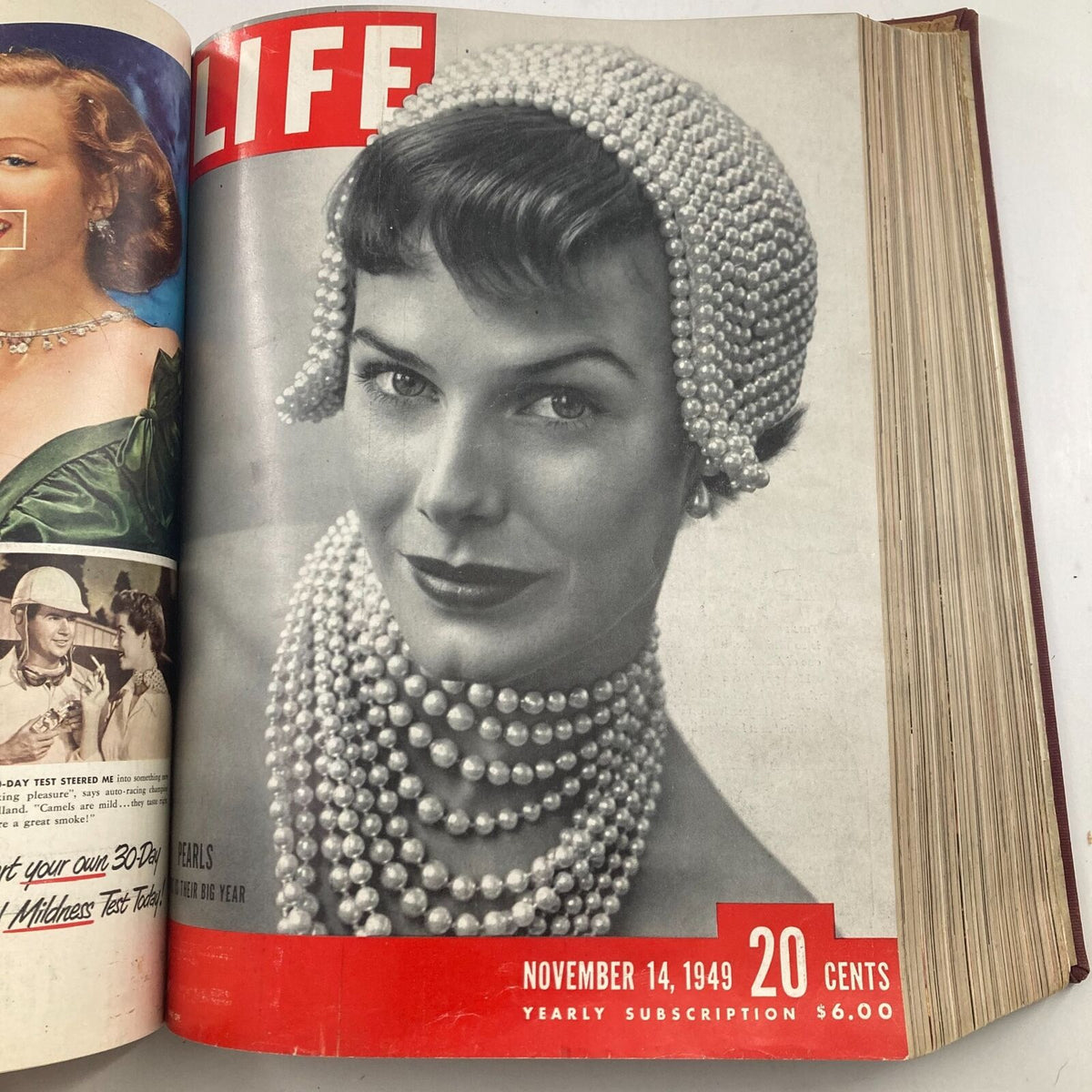 Cover of VTG 1949 Bound Life Magazine from November 14, 1949, showcasing a fashionable woman adorned with pearls, spotlighting contemporary fashion.