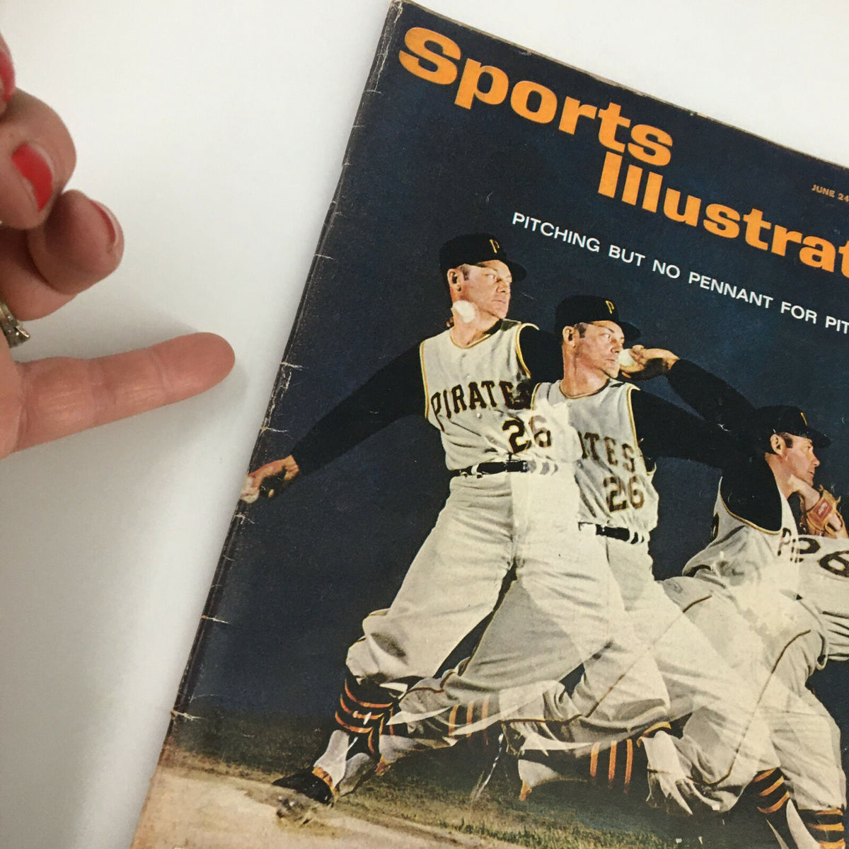 Close-up view of the cover of VTG Sports Illustrated Magazine June 24, 1963, showcasing Roy Face, 'Baseball's Best Reliever'. The image highlights the magazine's spine and the iconic team name 'Pirates'.