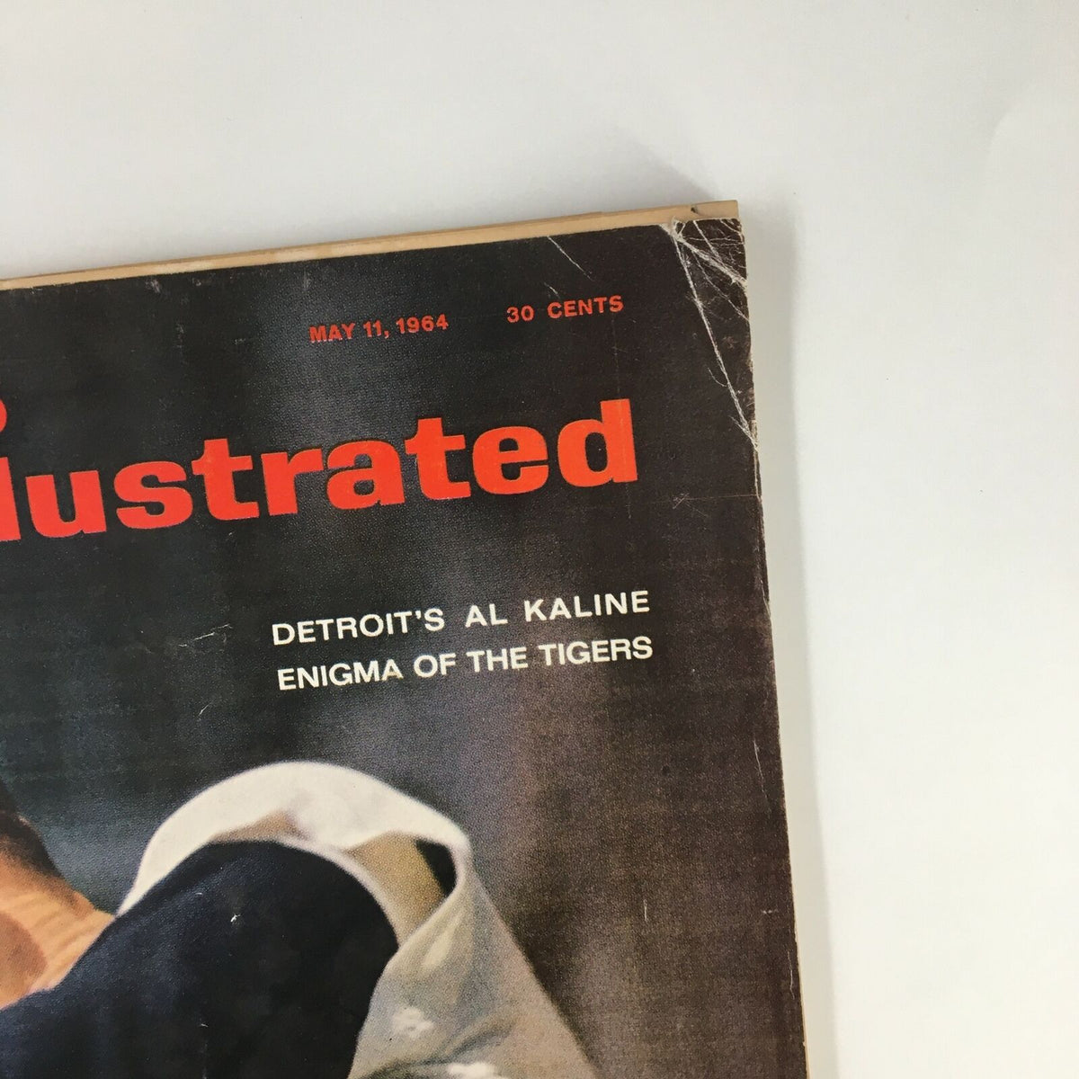 Vintage Sports Illustrated magazine cover from May 11, 1984, featuring Detroit's Al Kaline, titled 'Enigma of the Tigers'. The magazine shows signs of wear with a crease at the top, displaying its collectible nature.